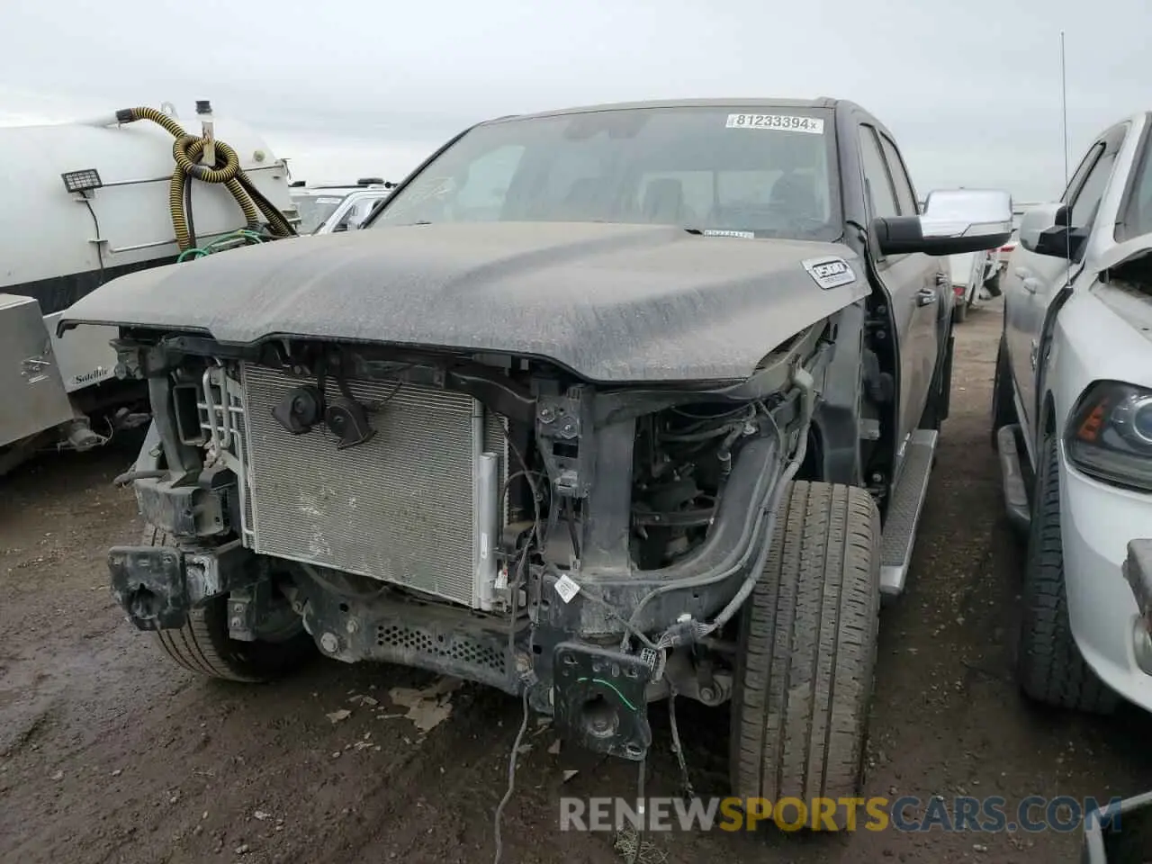 1 Photograph of a damaged car 1C6SRFJT7NN213412 RAM 1500 2022