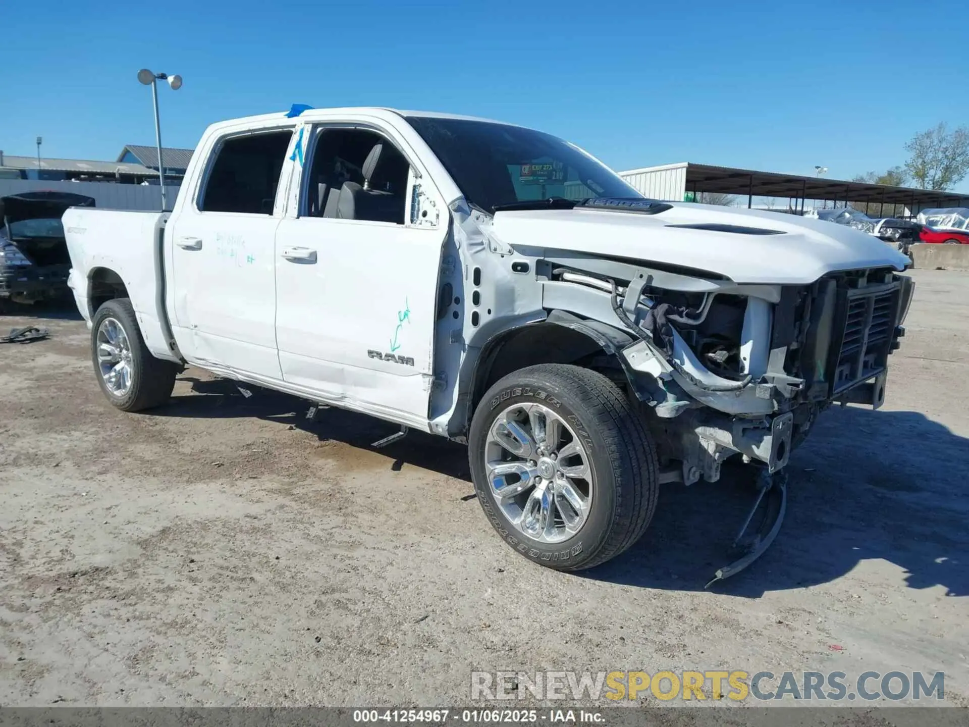 1 Photograph of a damaged car 1C6SRFJT8NN418429 RAM 1500 2022