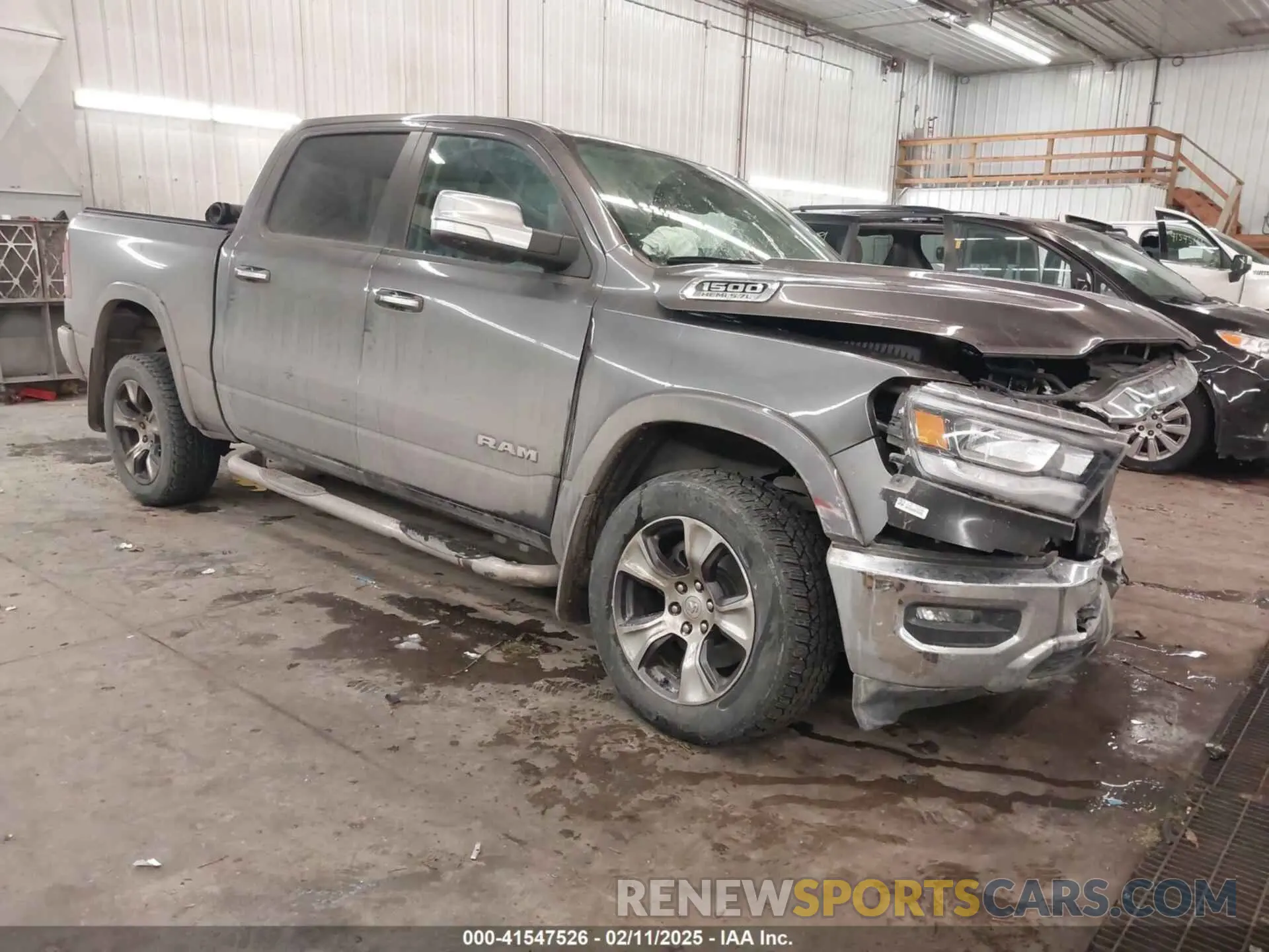 1 Photograph of a damaged car 1C6SRFJT9NN225321 RAM 1500 2022
