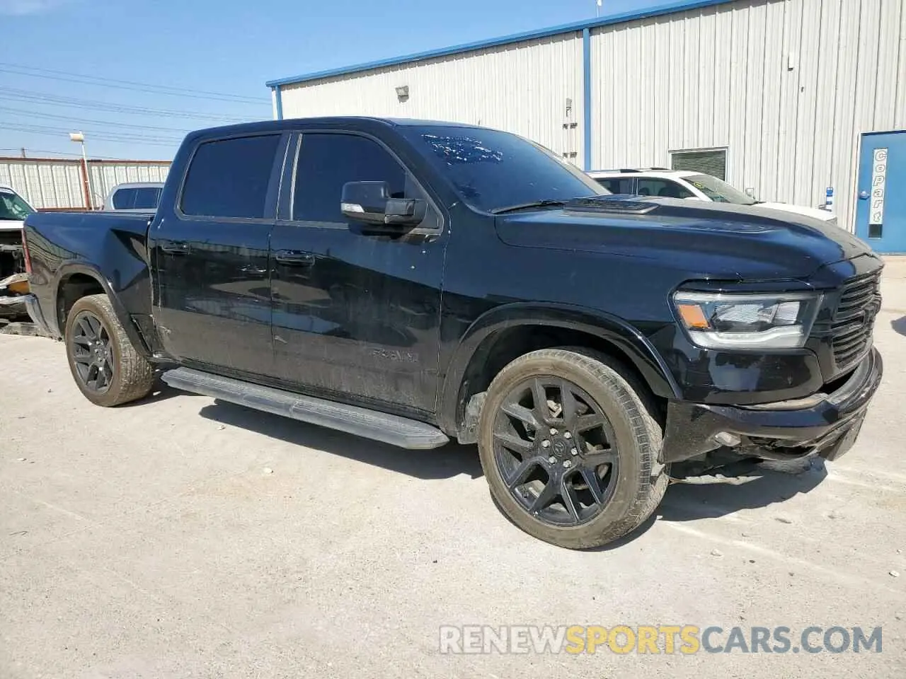 4 Photograph of a damaged car 1C6SRFJT9NN385019 RAM 1500 2022