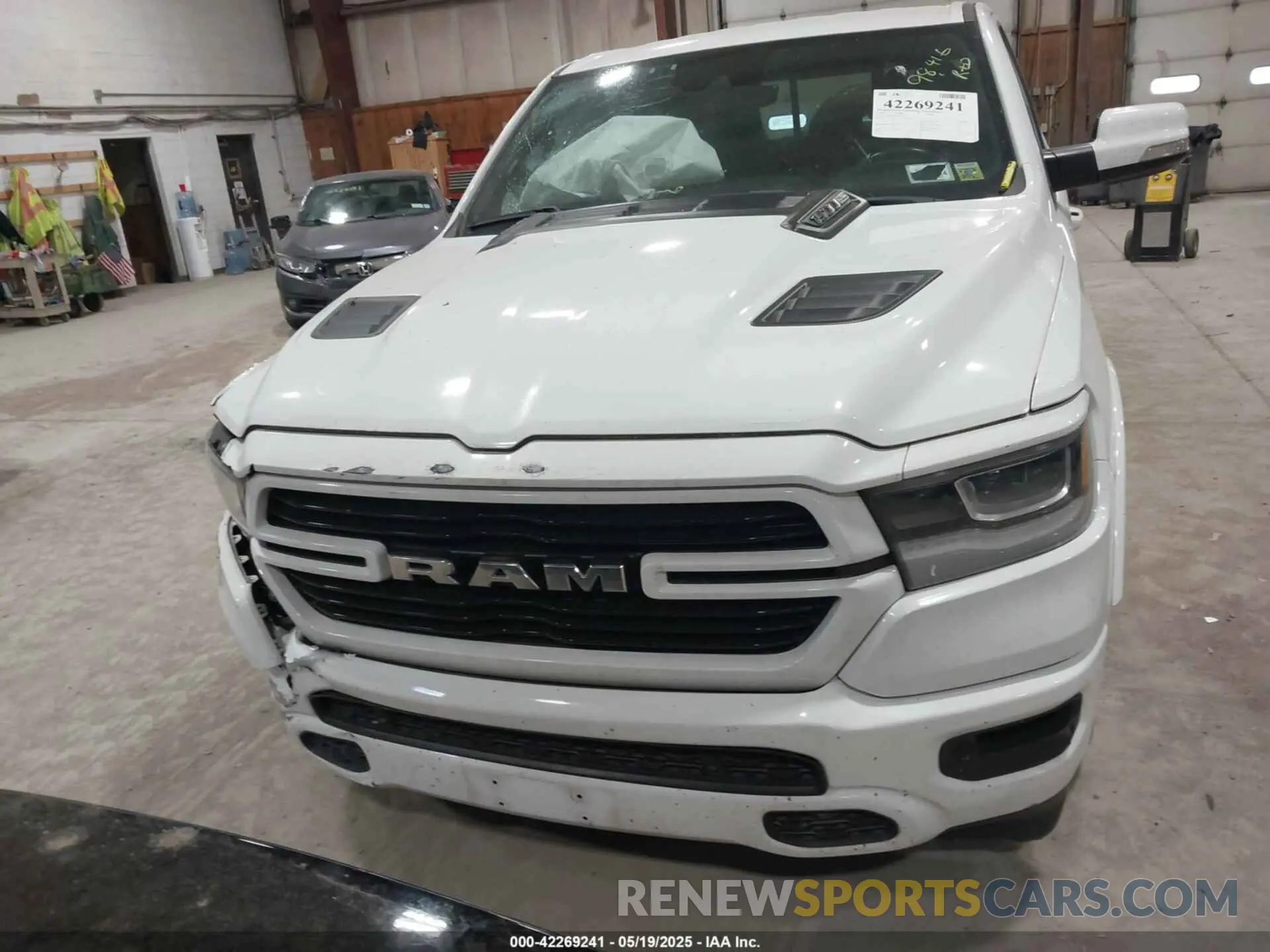 13 Photograph of a damaged car 1C6SRFJTXNN222654 RAM 1500 2022