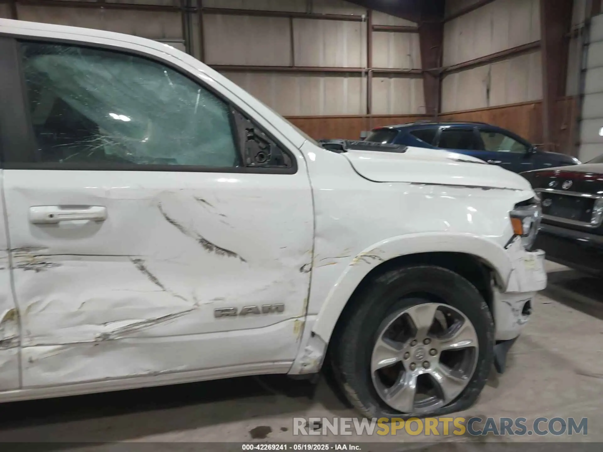 18 Photograph of a damaged car 1C6SRFJTXNN222654 RAM 1500 2022