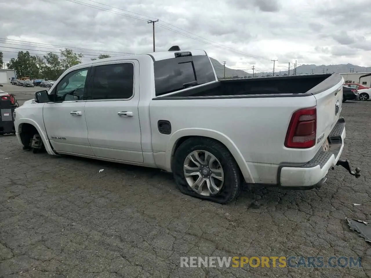 2 Photograph of a damaged car 1C6SRFKM9NN119832 RAM 1500 2022