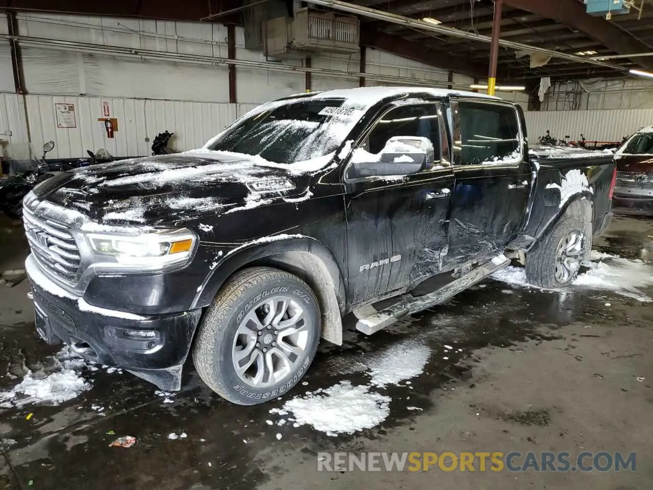 1 Photograph of a damaged car 1C6SRFKT0NN411313 RAM 1500 2022