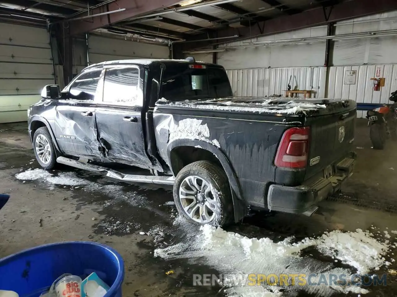2 Photograph of a damaged car 1C6SRFKT0NN411313 RAM 1500 2022