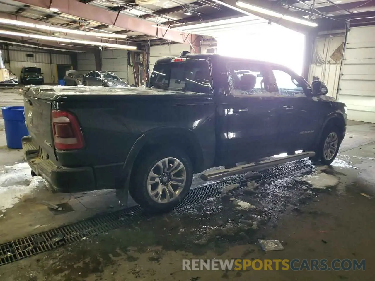 3 Photograph of a damaged car 1C6SRFKT0NN411313 RAM 1500 2022
