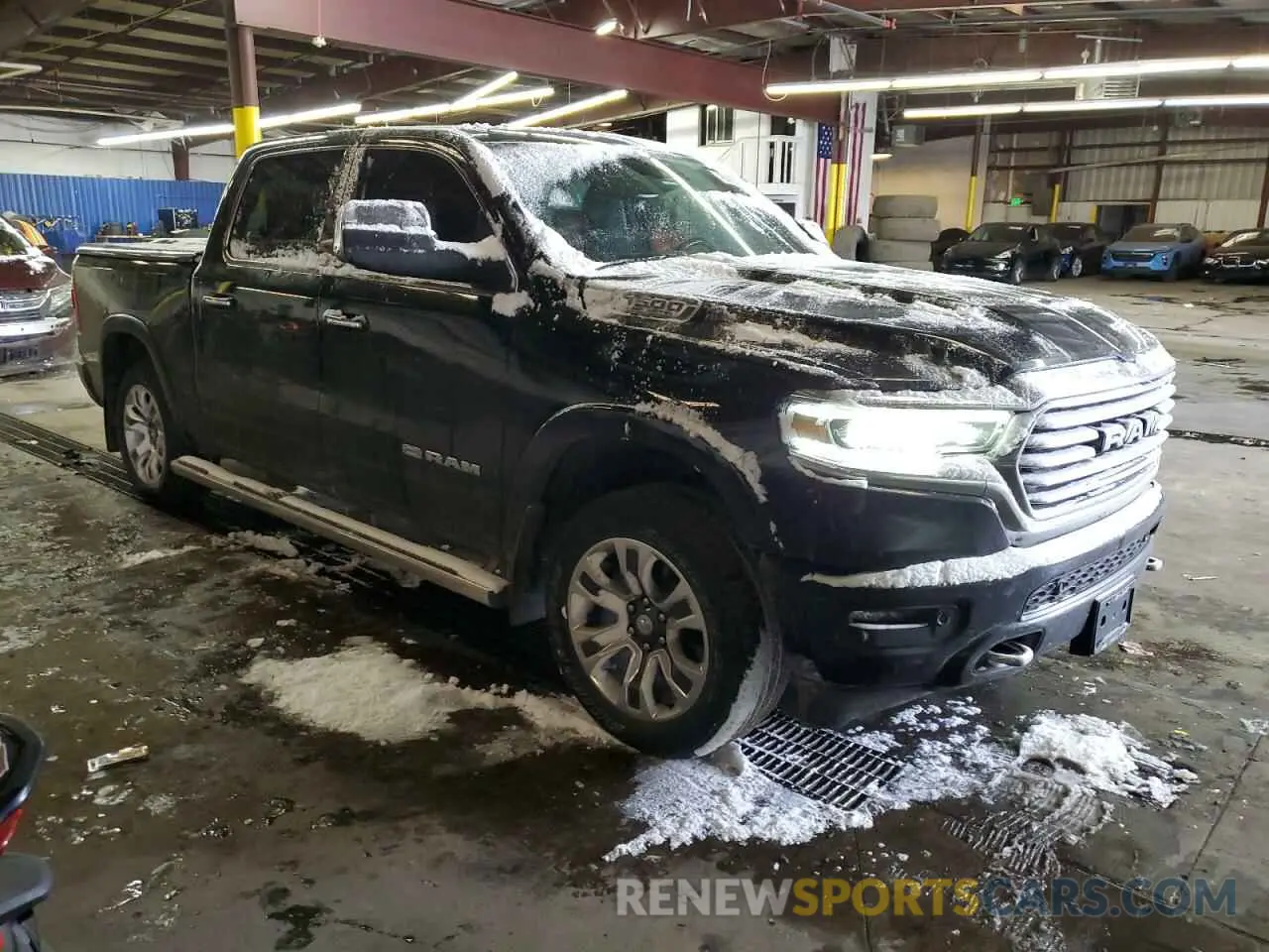 4 Photograph of a damaged car 1C6SRFKT0NN411313 RAM 1500 2022