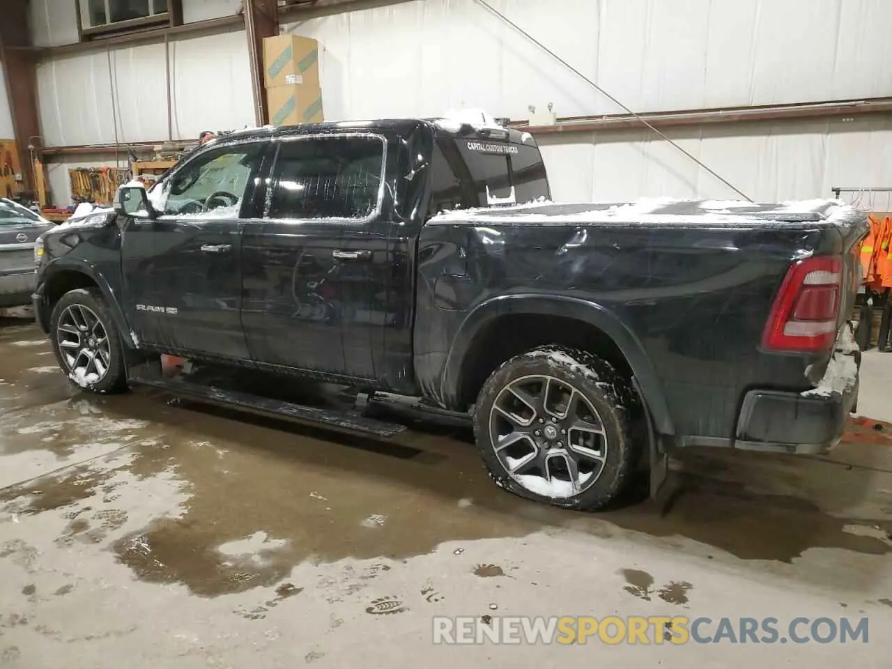 2 Photograph of a damaged car 1C6SRFKT8NN107890 RAM 1500 2022