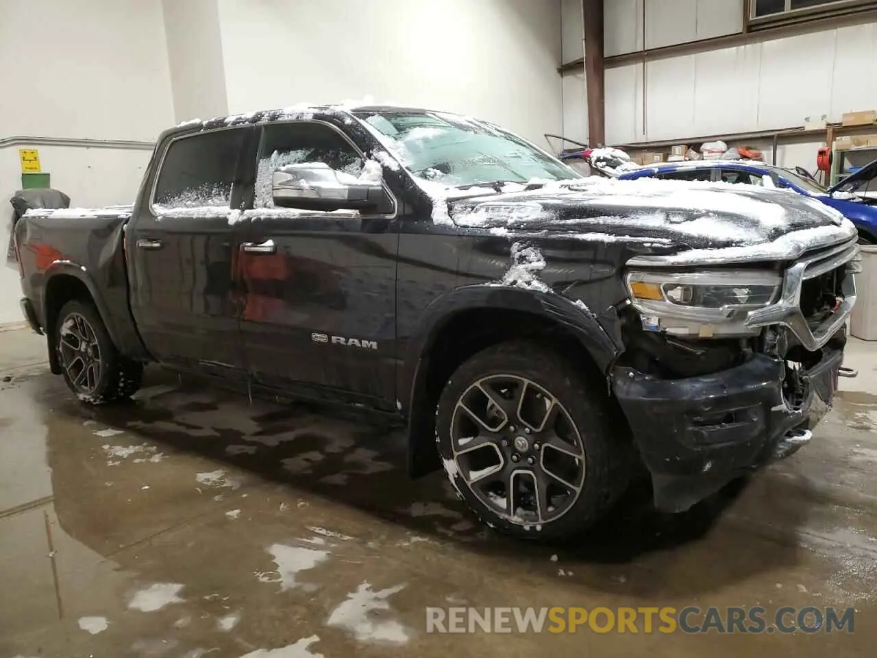 4 Photograph of a damaged car 1C6SRFKT8NN107890 RAM 1500 2022