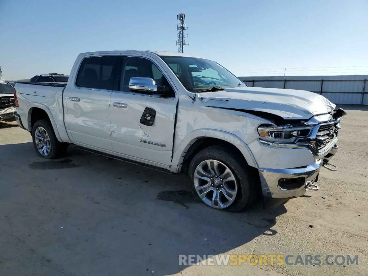 4 Photograph of a damaged car 1C6SRFKTXNN213838 RAM 1500 2022