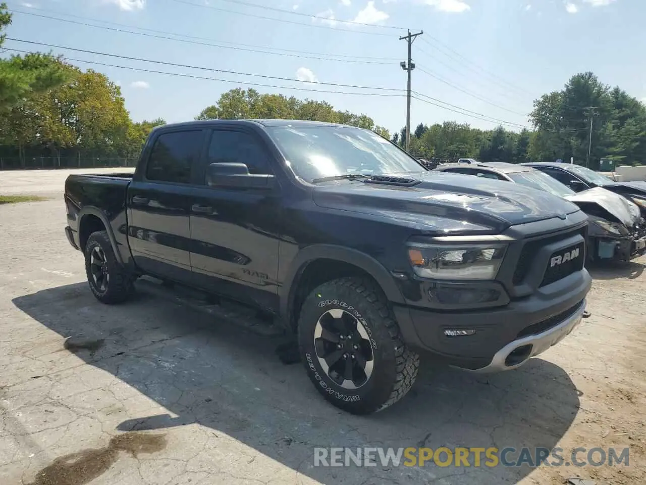4 Photograph of a damaged car 1C6SRFLM7NN362506 RAM 1500 2022