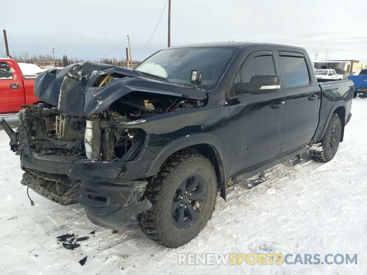 1 Photograph of a damaged car 1C6SRFLM8NN168938 RAM 1500 2022