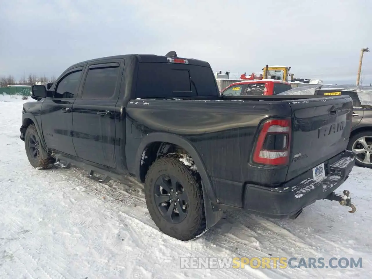 2 Photograph of a damaged car 1C6SRFLM8NN168938 RAM 1500 2022