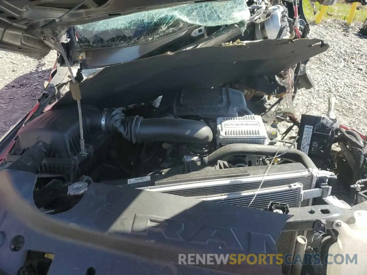 11 Photograph of a damaged car 1C6SRFLT1NN112993 RAM 1500 2022