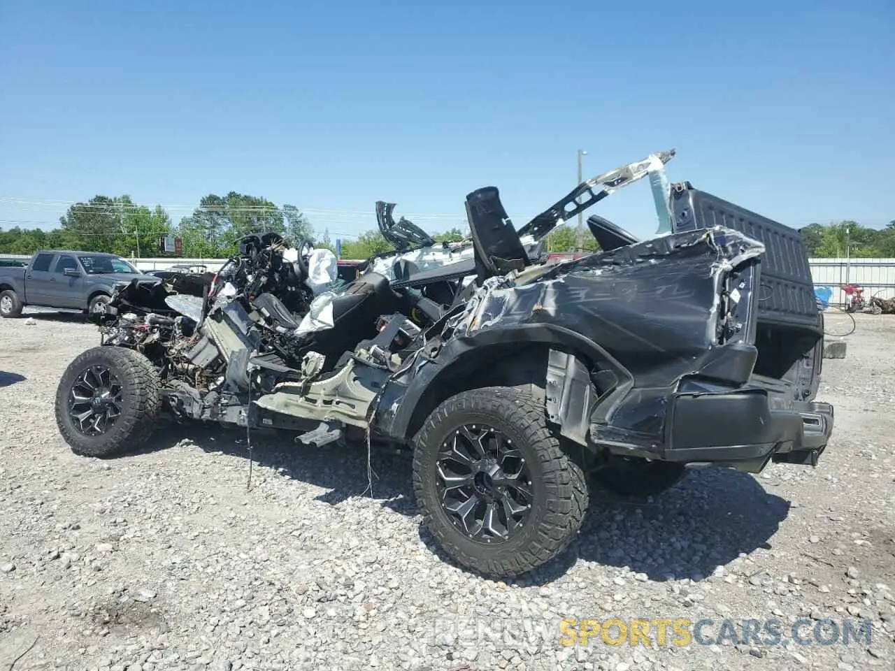 2 Photograph of a damaged car 1C6SRFLT1NN112993 RAM 1500 2022