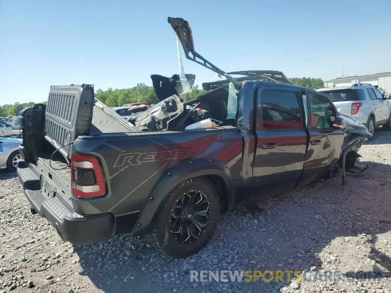 3 Photograph of a damaged car 1C6SRFLT1NN112993 RAM 1500 2022