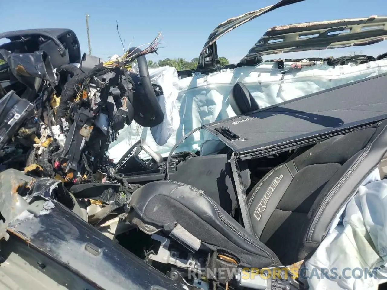 7 Photograph of a damaged car 1C6SRFLT1NN112993 RAM 1500 2022