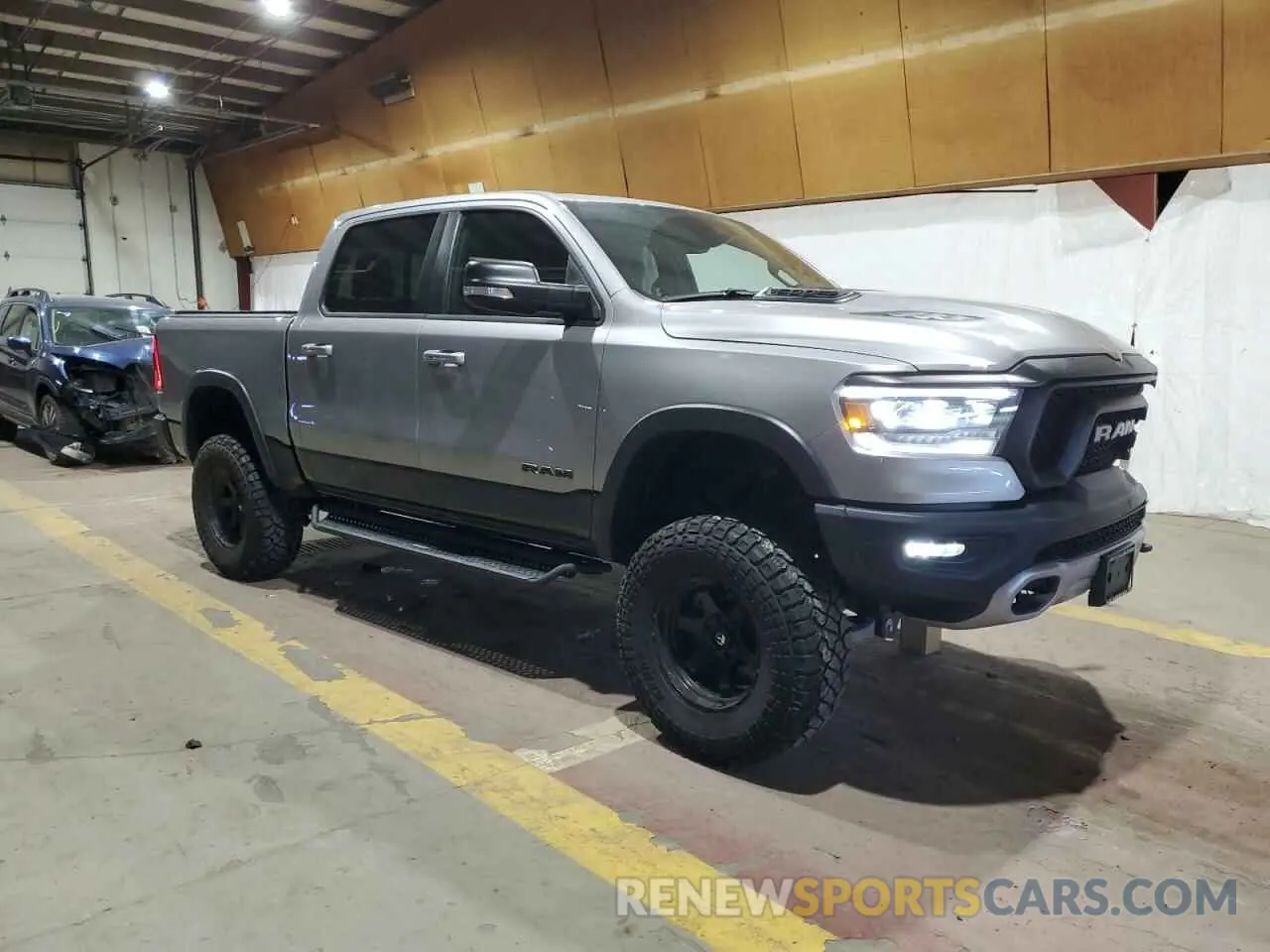 4 Photograph of a damaged car 1C6SRFLT1NN258780 RAM 1500 2022