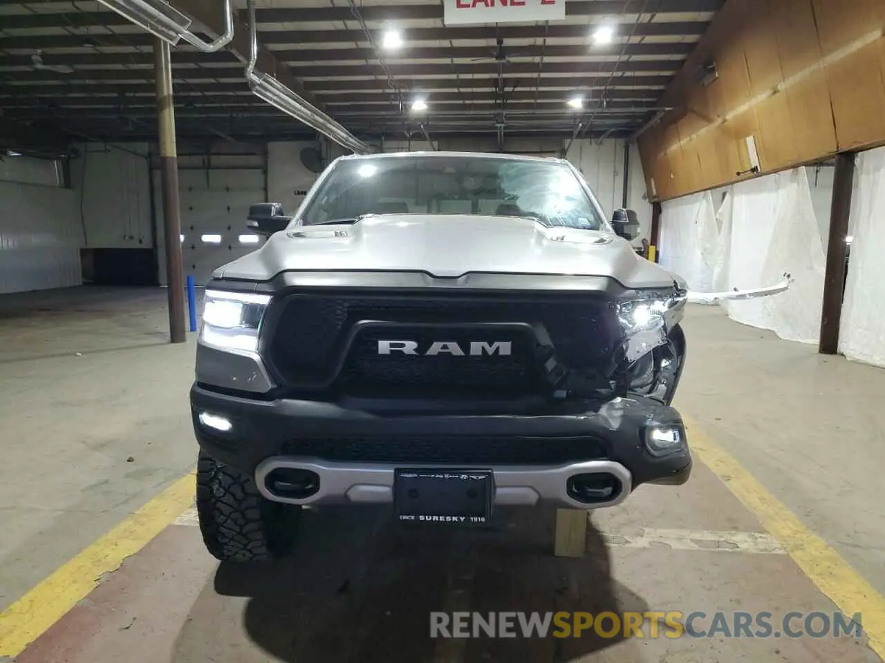 5 Photograph of a damaged car 1C6SRFLT1NN258780 RAM 1500 2022