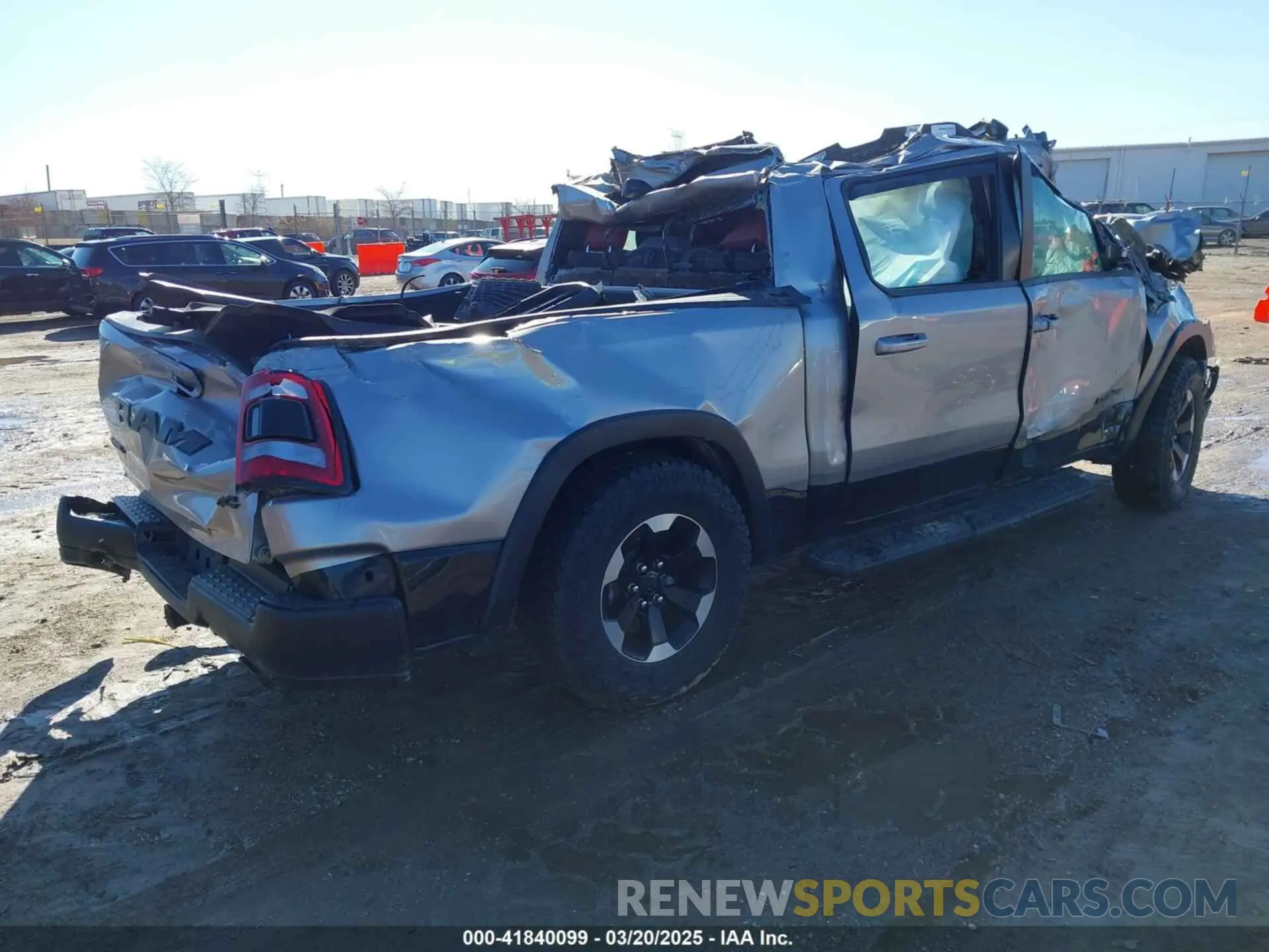 4 Photograph of a damaged car 1C6SRFLT7NN196608 RAM 1500 2022