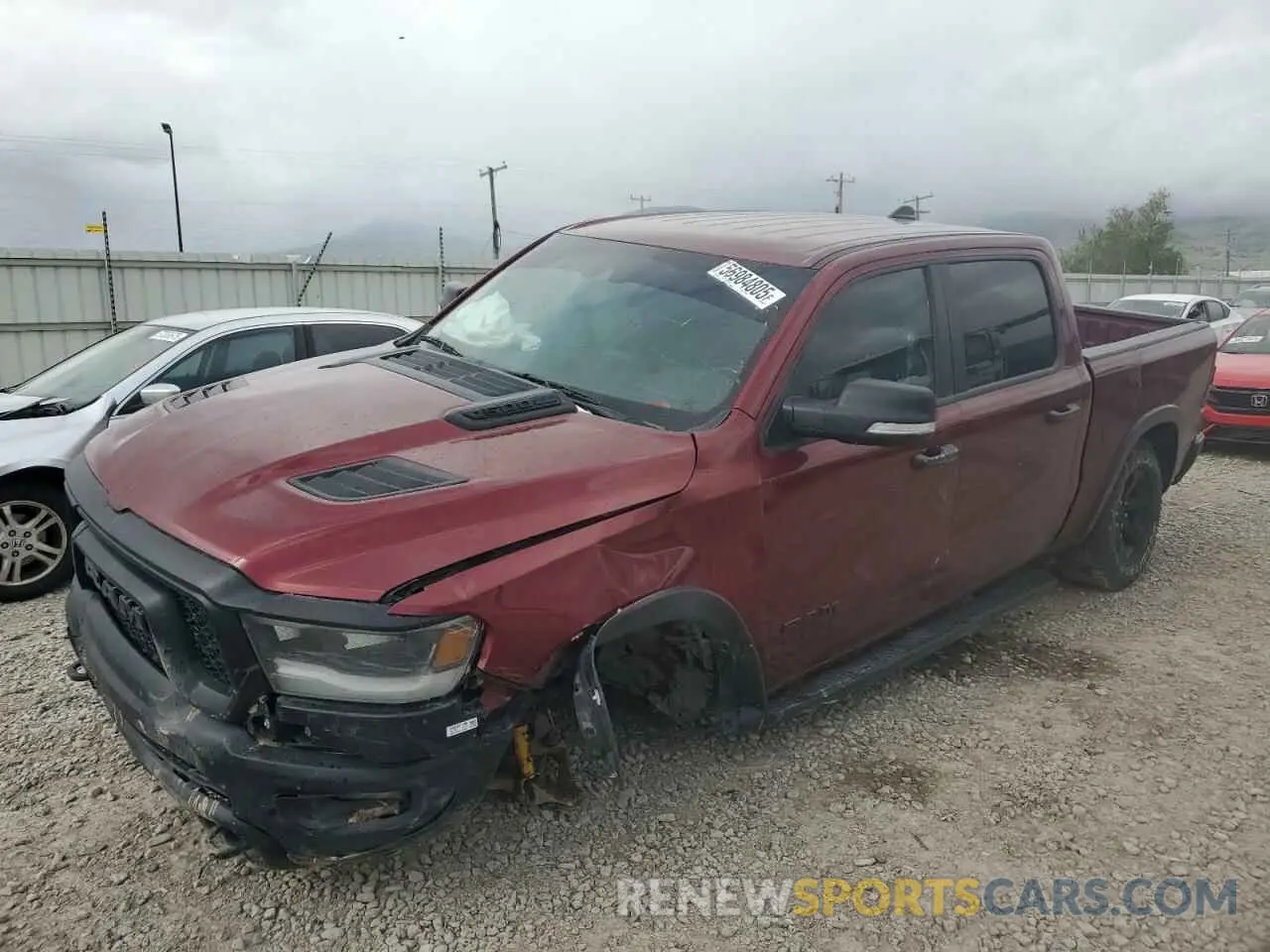 1 Photograph of a damaged car 1C6SRFLT7NN418872 RAM 1500 2022