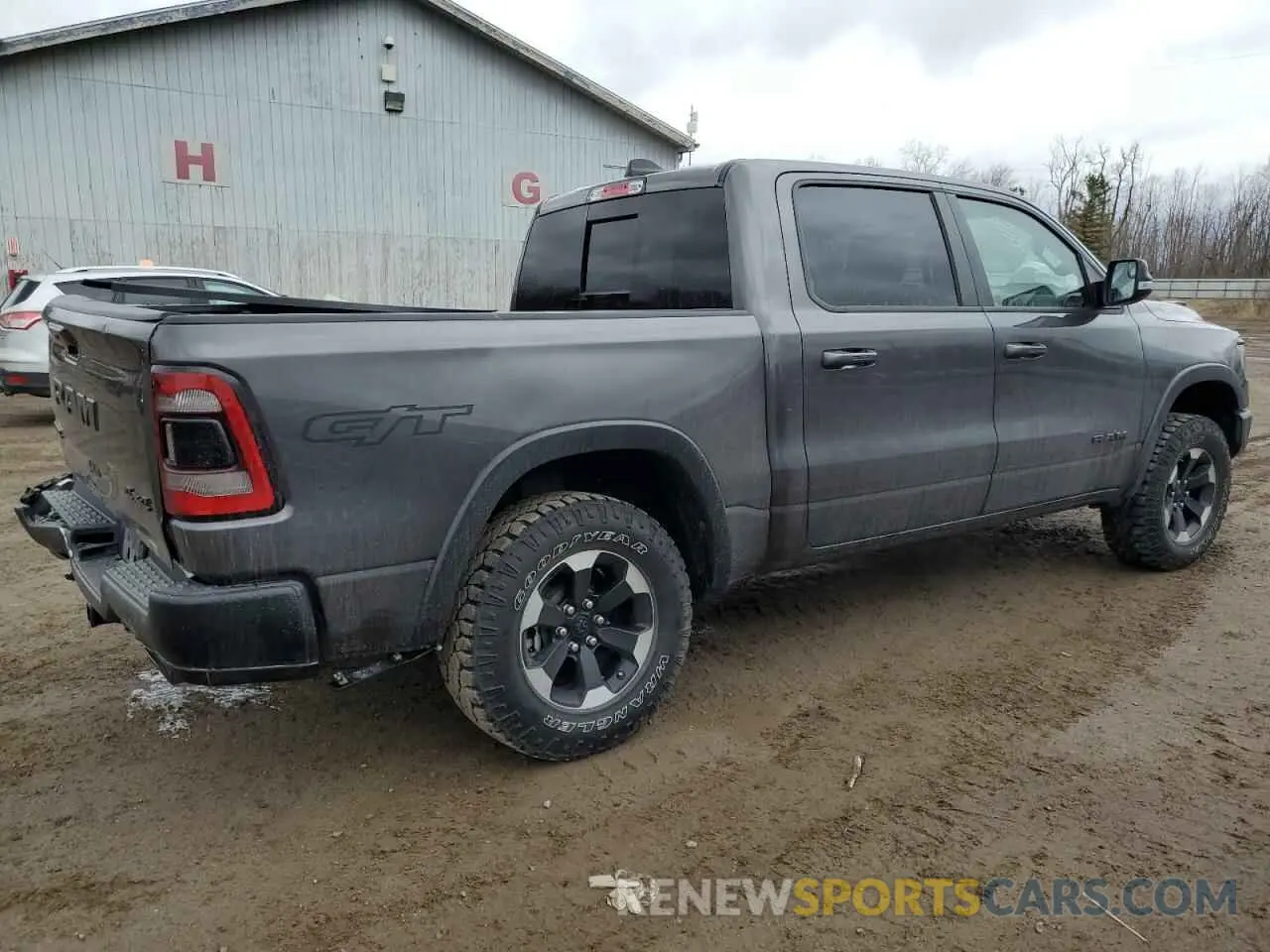 3 Photograph of a damaged car 1C6SRFLT9NN321513 RAM 1500 2022