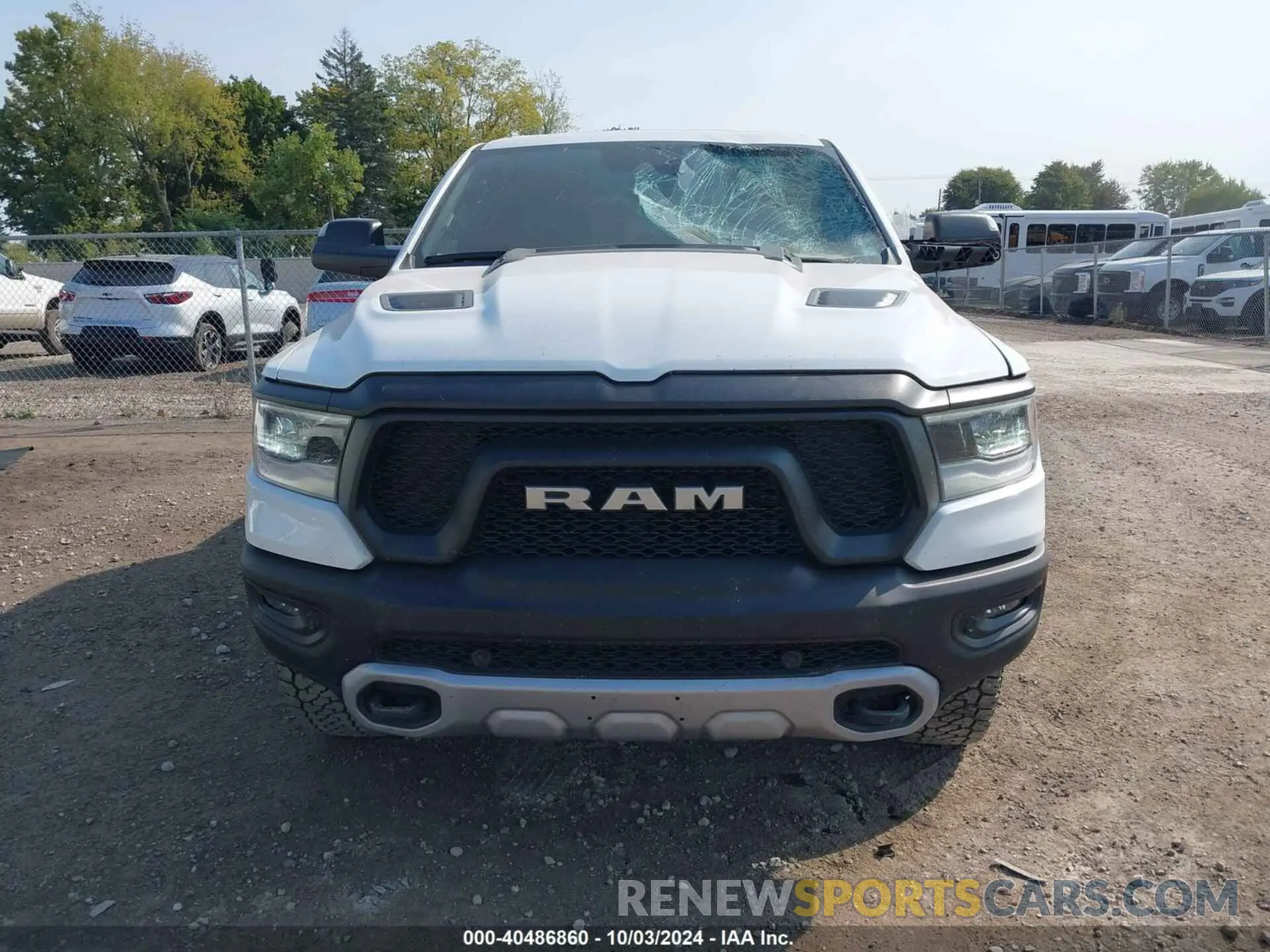 12 Photograph of a damaged car 1C6SRFLTXNN338532 RAM 1500 2022