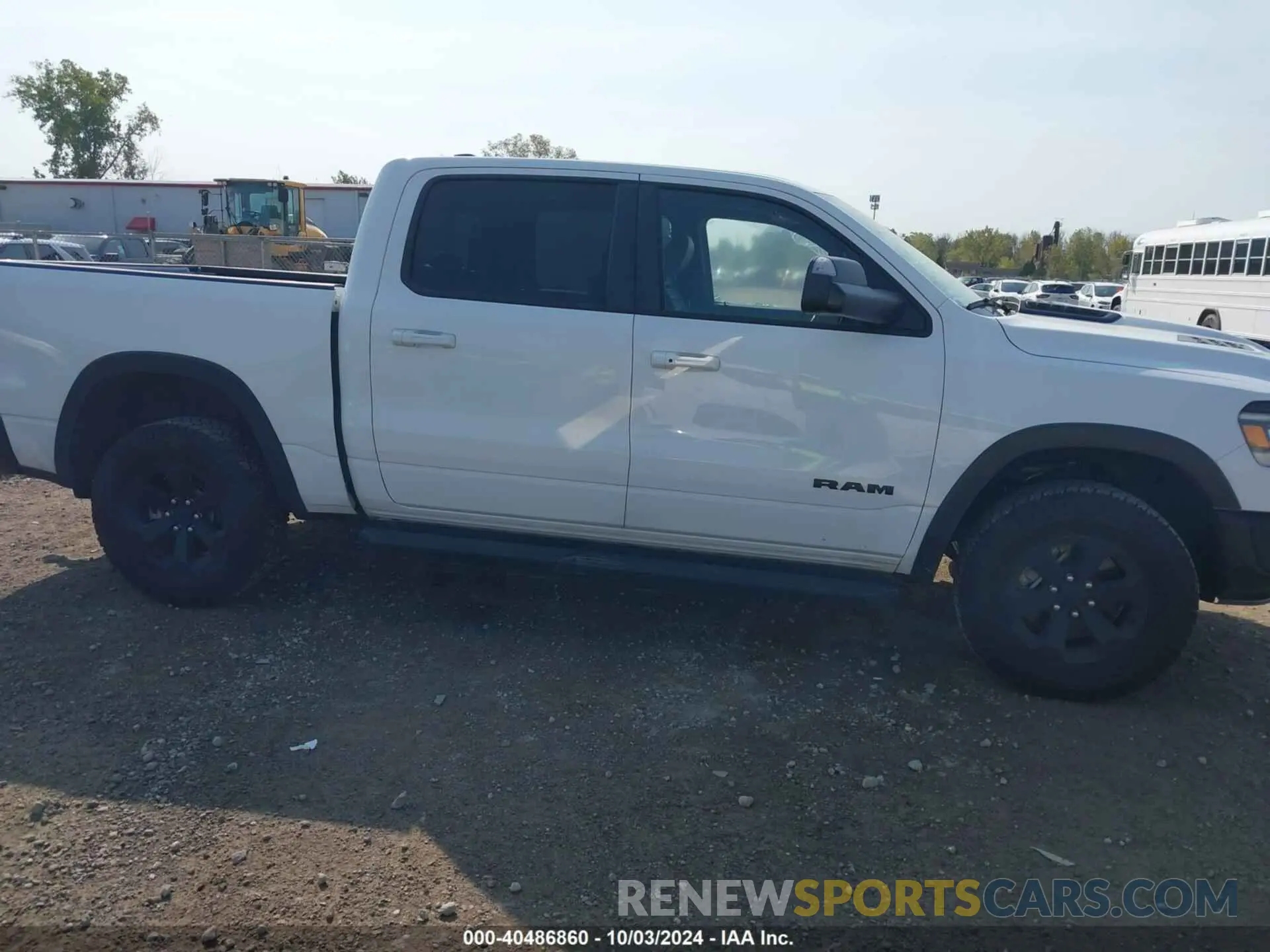 13 Photograph of a damaged car 1C6SRFLTXNN338532 RAM 1500 2022