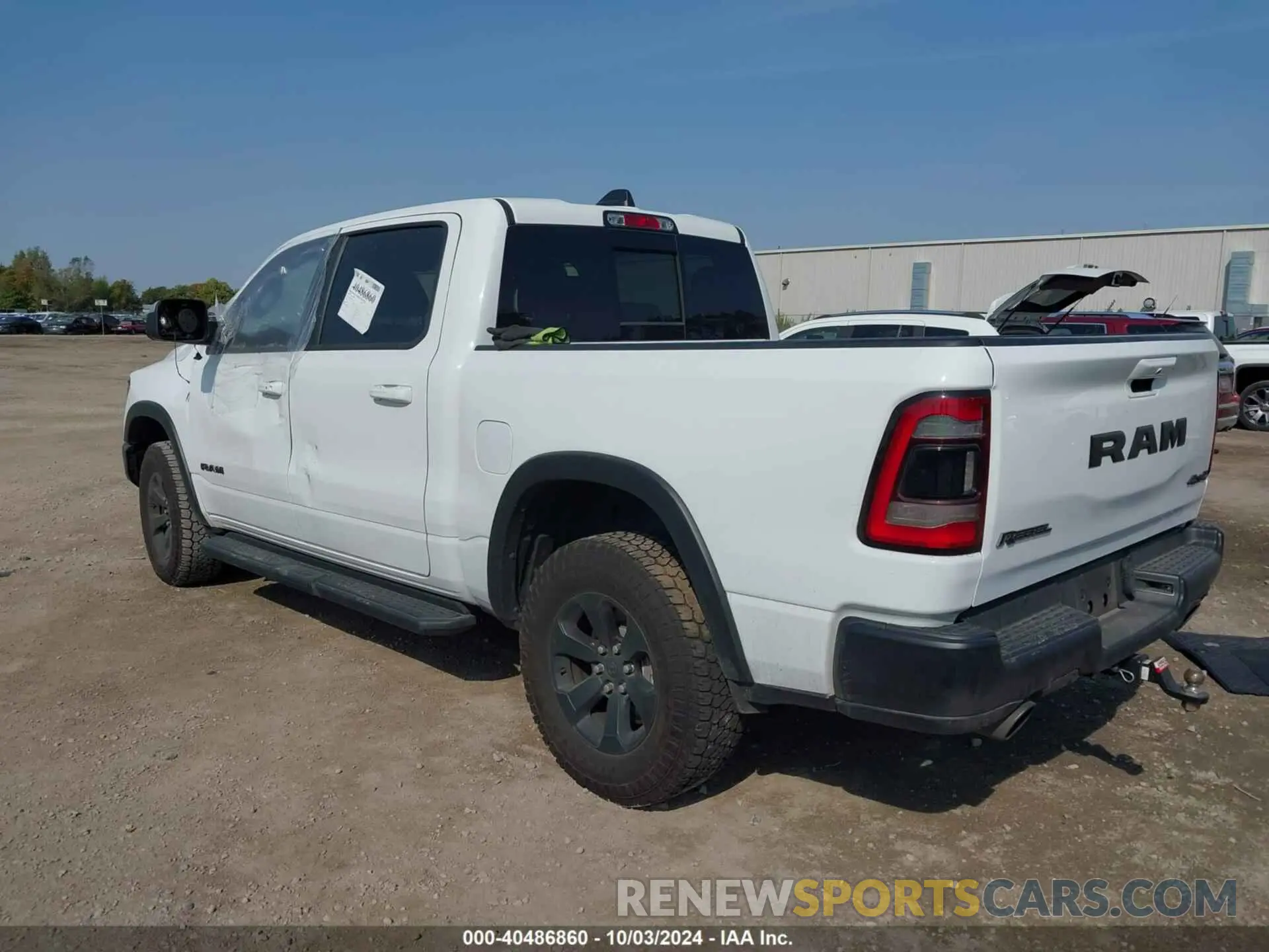 3 Photograph of a damaged car 1C6SRFLTXNN338532 RAM 1500 2022