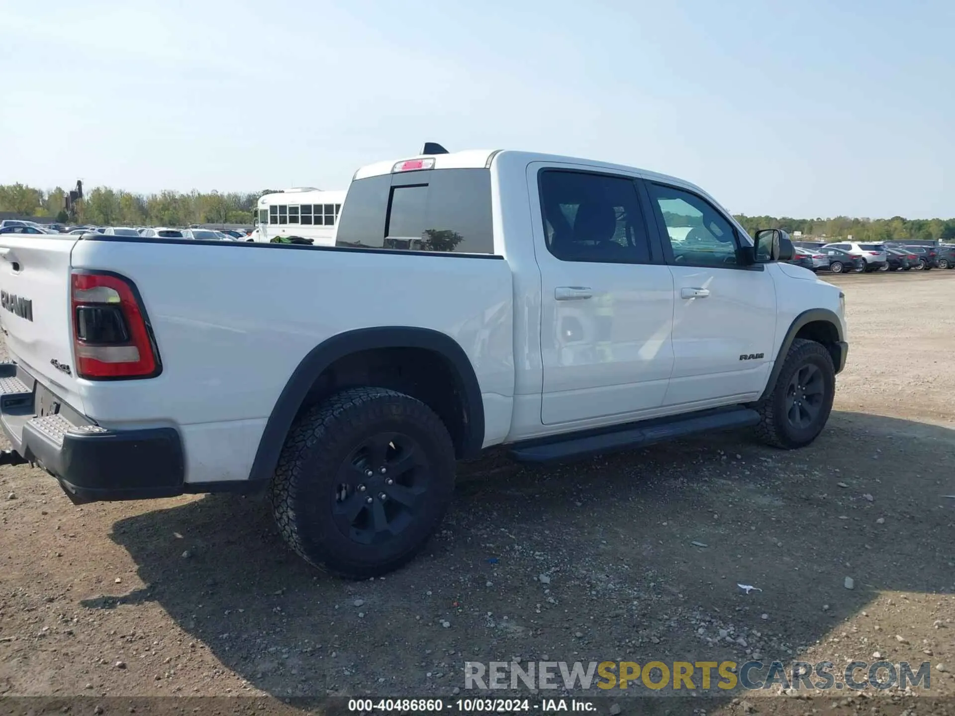 4 Photograph of a damaged car 1C6SRFLTXNN338532 RAM 1500 2022