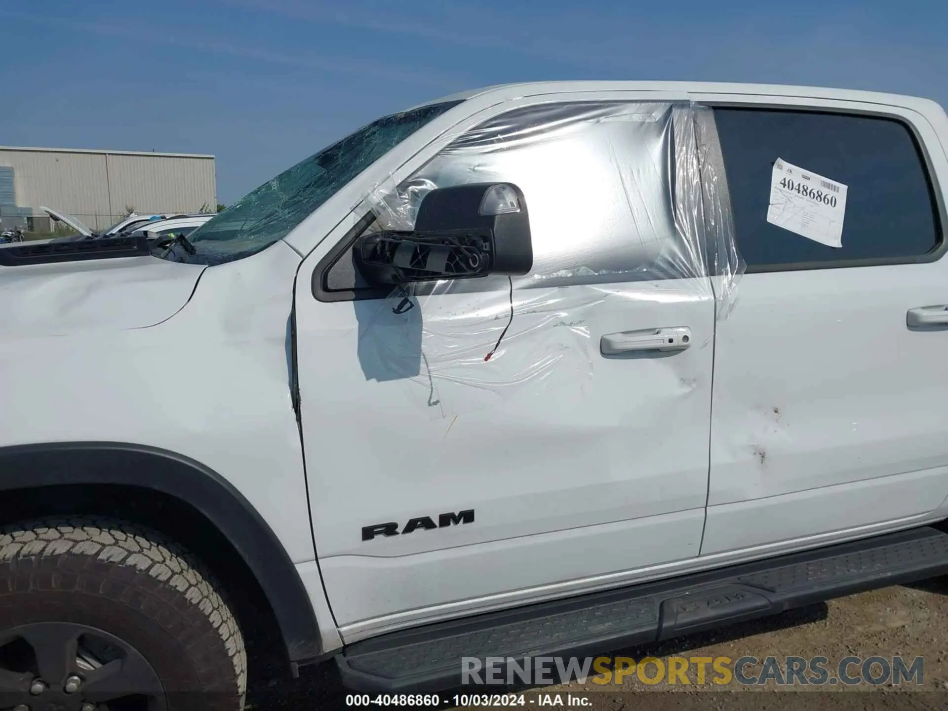 6 Photograph of a damaged car 1C6SRFLTXNN338532 RAM 1500 2022