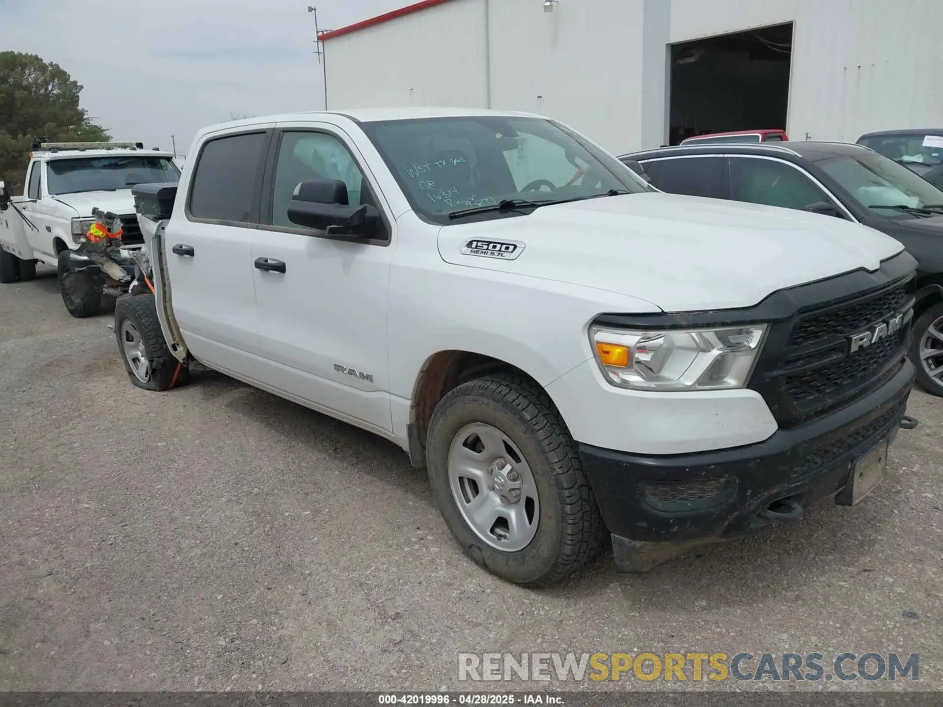 1 Photograph of a damaged car 1C6SRFNT0NN416927 RAM 1500 2022