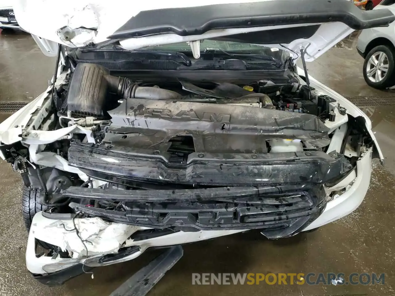 12 Photograph of a damaged car 1C6SRFRT9NN387423 RAM 1500 2022