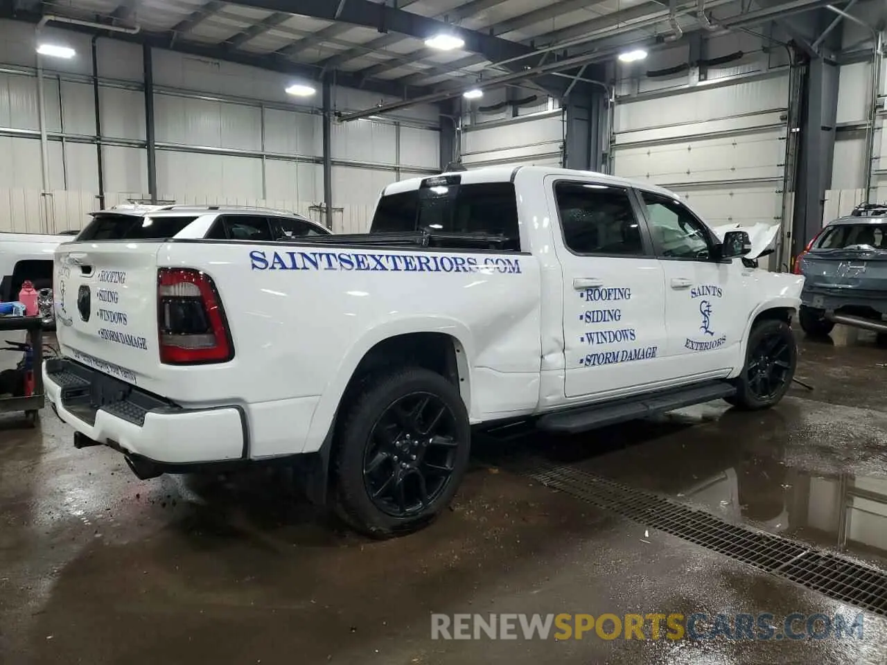 3 Photograph of a damaged car 1C6SRFRT9NN387423 RAM 1500 2022