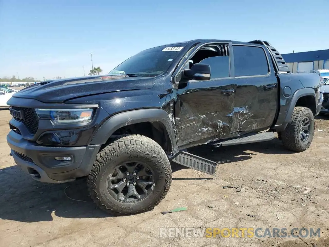 1 Photograph of a damaged car 1C6SRFU91NN112513 RAM 1500 2022