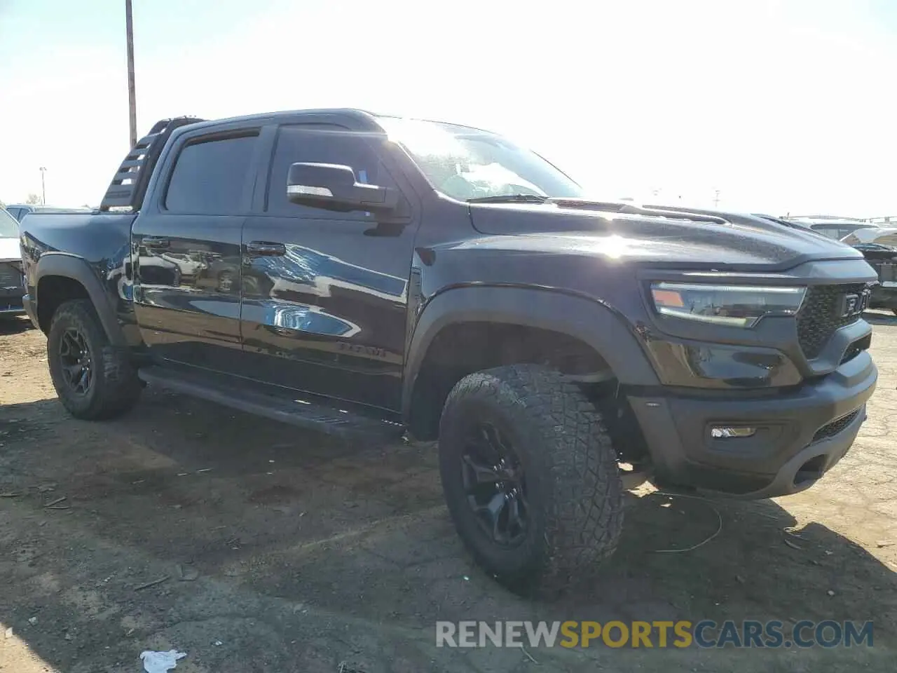 4 Photograph of a damaged car 1C6SRFU91NN112513 RAM 1500 2022