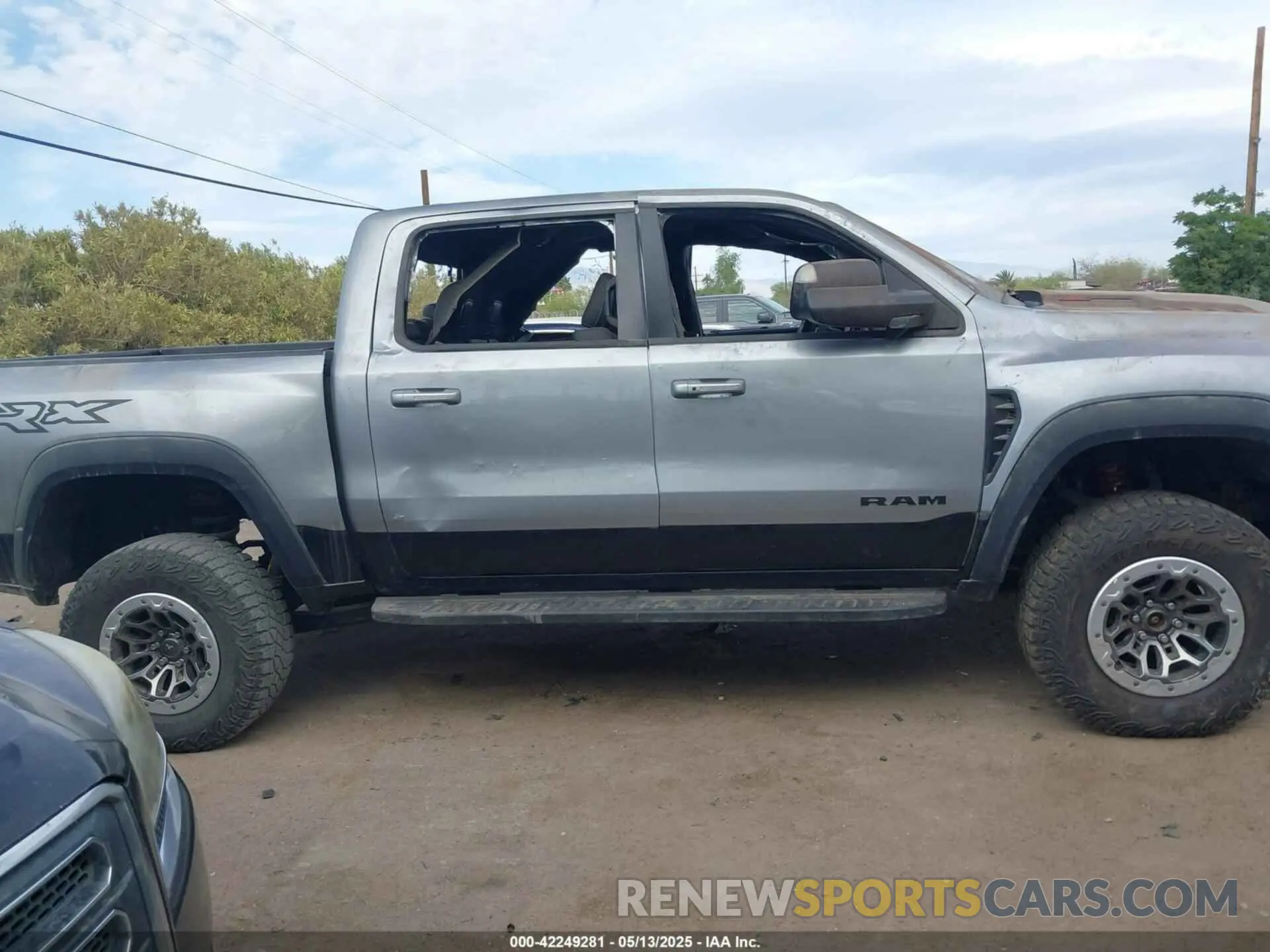 13 Photograph of a damaged car 1C6SRFU93NN246262 RAM 1500 2022