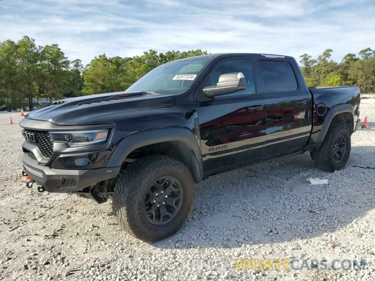 1 Photograph of a damaged car 1C6SRFU93NN335250 RAM 1500 2022