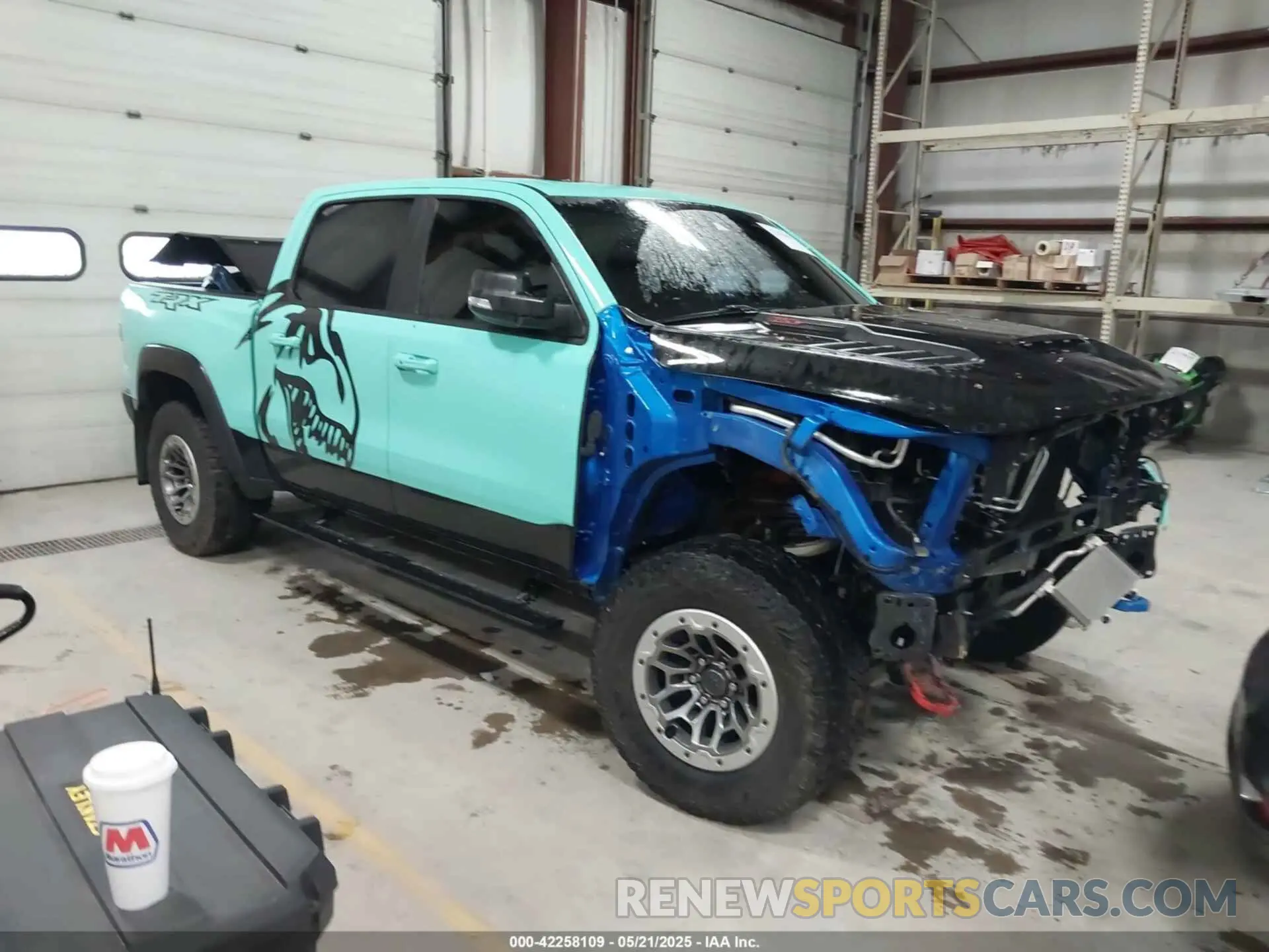 1 Photograph of a damaged car 1C6SRFU93NN368958 RAM 1500 2022