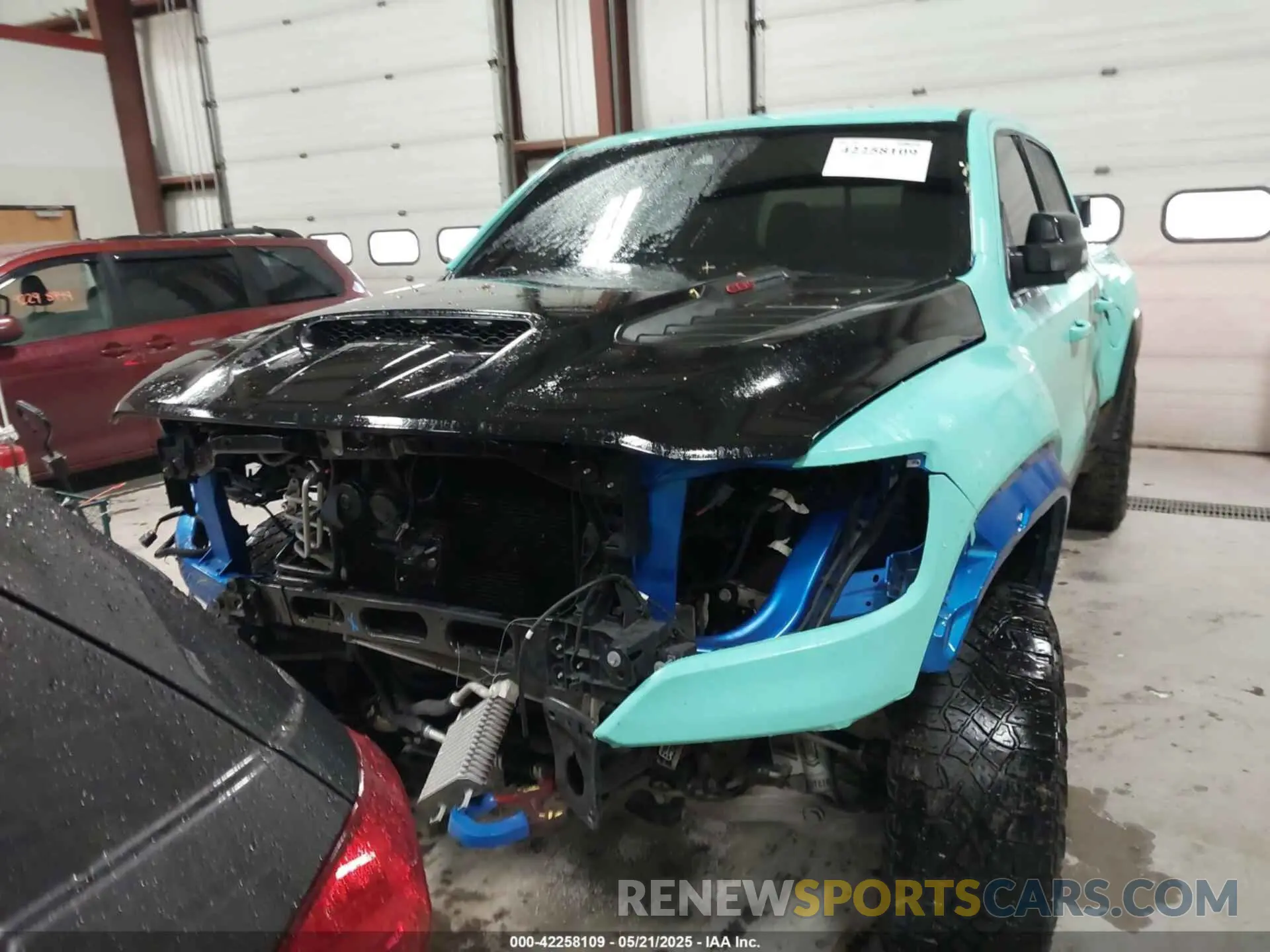 13 Photograph of a damaged car 1C6SRFU93NN368958 RAM 1500 2022