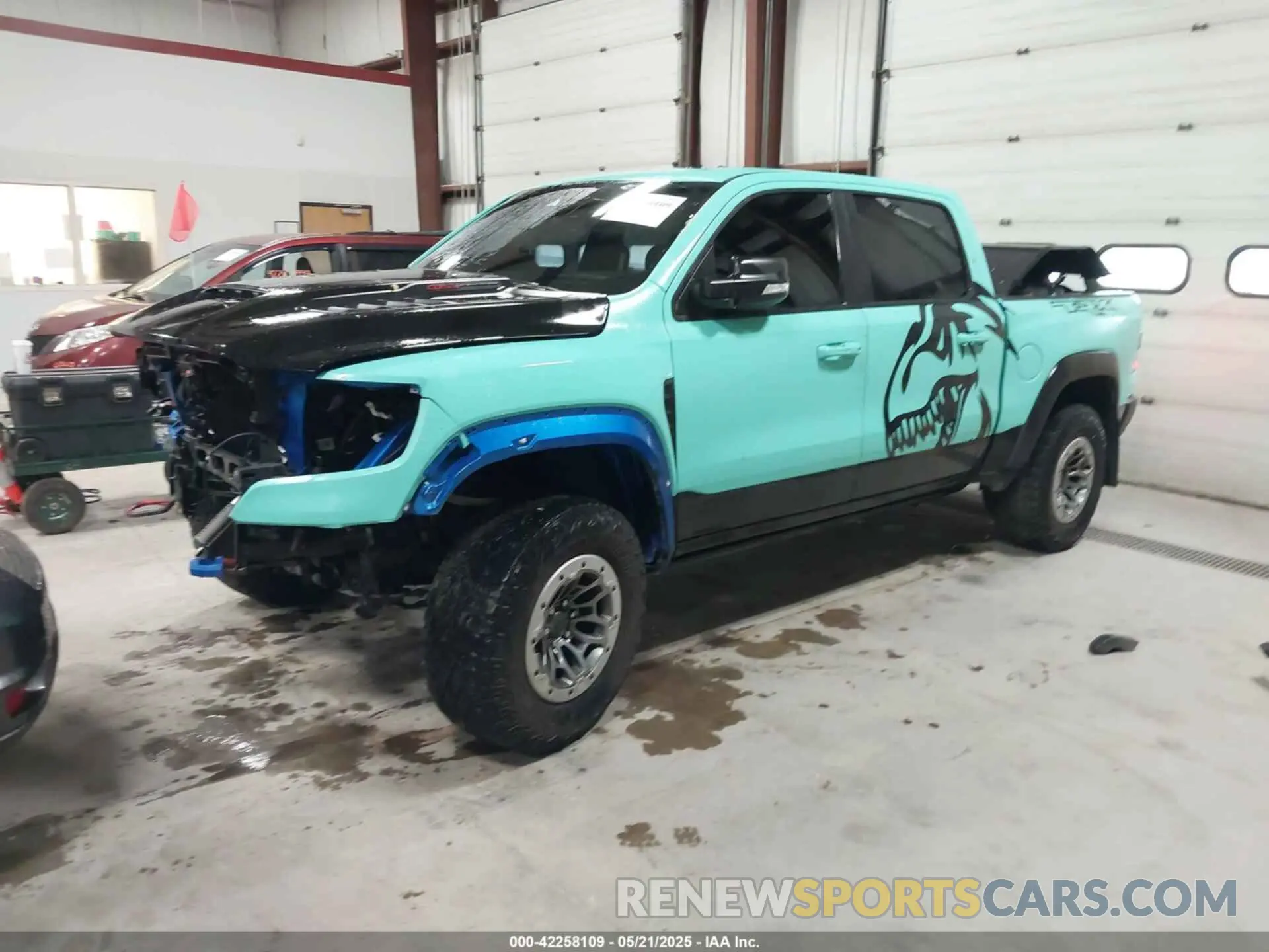 2 Photograph of a damaged car 1C6SRFU93NN368958 RAM 1500 2022