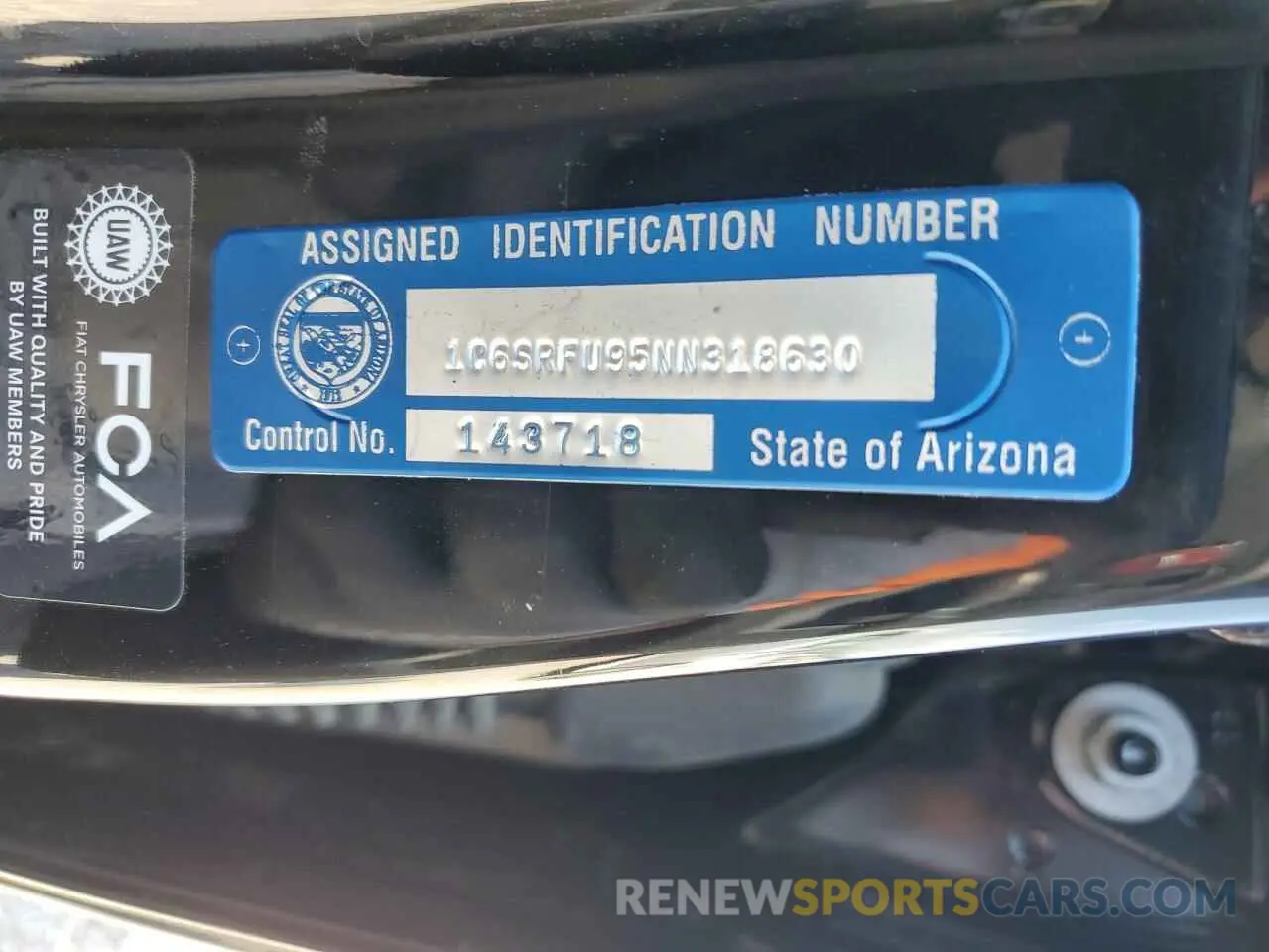 12 Photograph of a damaged car 1C6SRFU95NN318630 RAM 1500 2022
