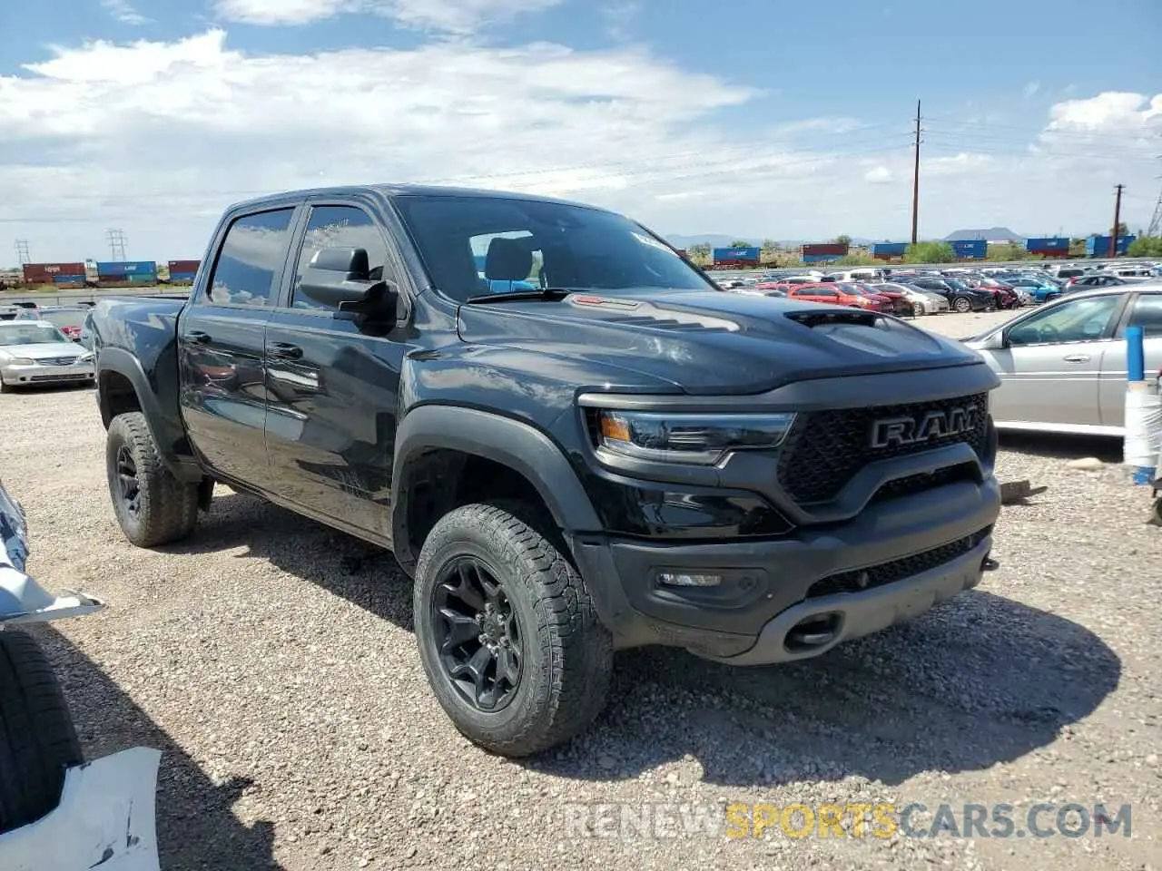 4 Photograph of a damaged car 1C6SRFU95NN318630 RAM 1500 2022