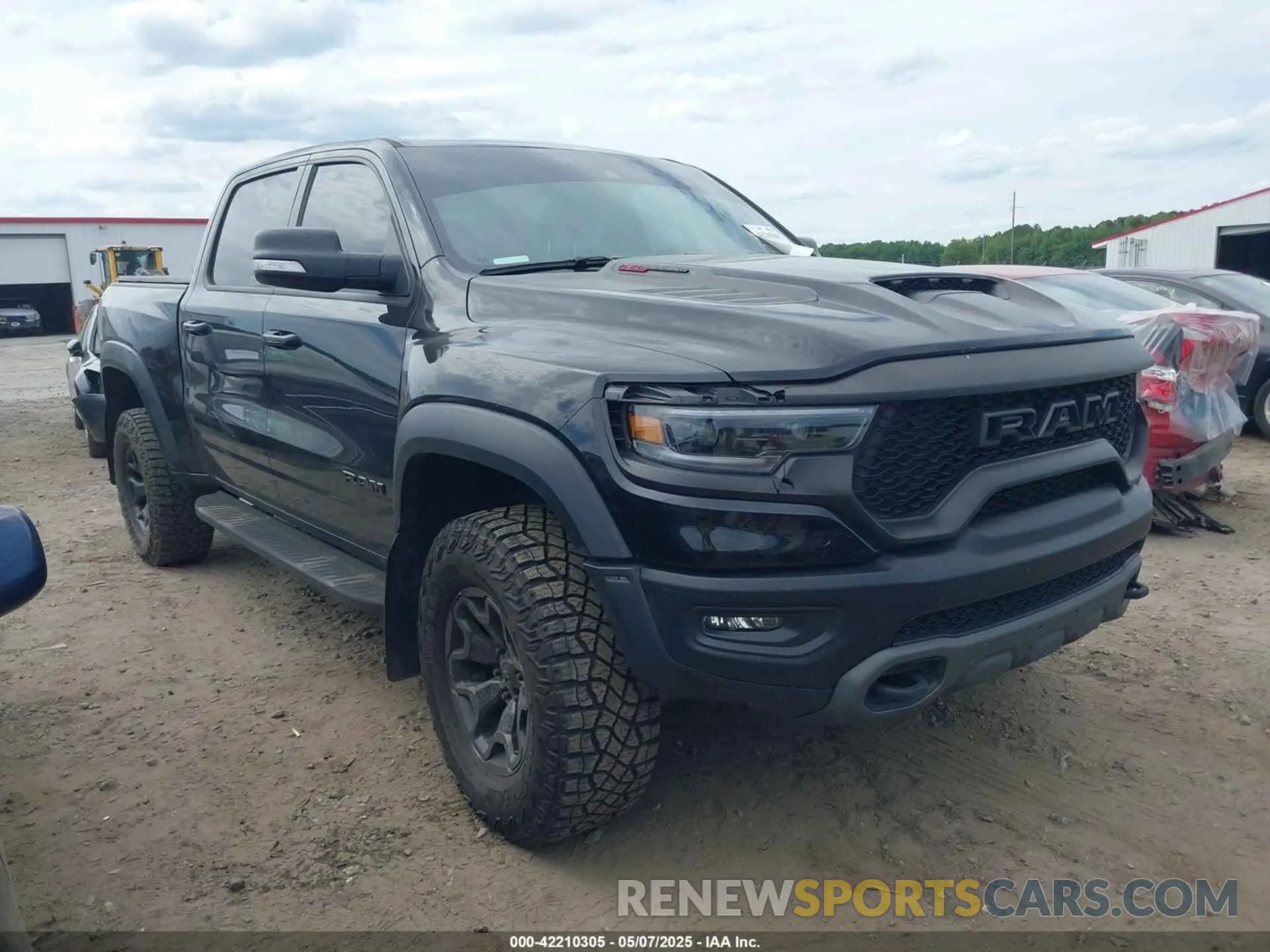 1 Photograph of a damaged car 1C6SRFU97NN112337 RAM 1500 2022