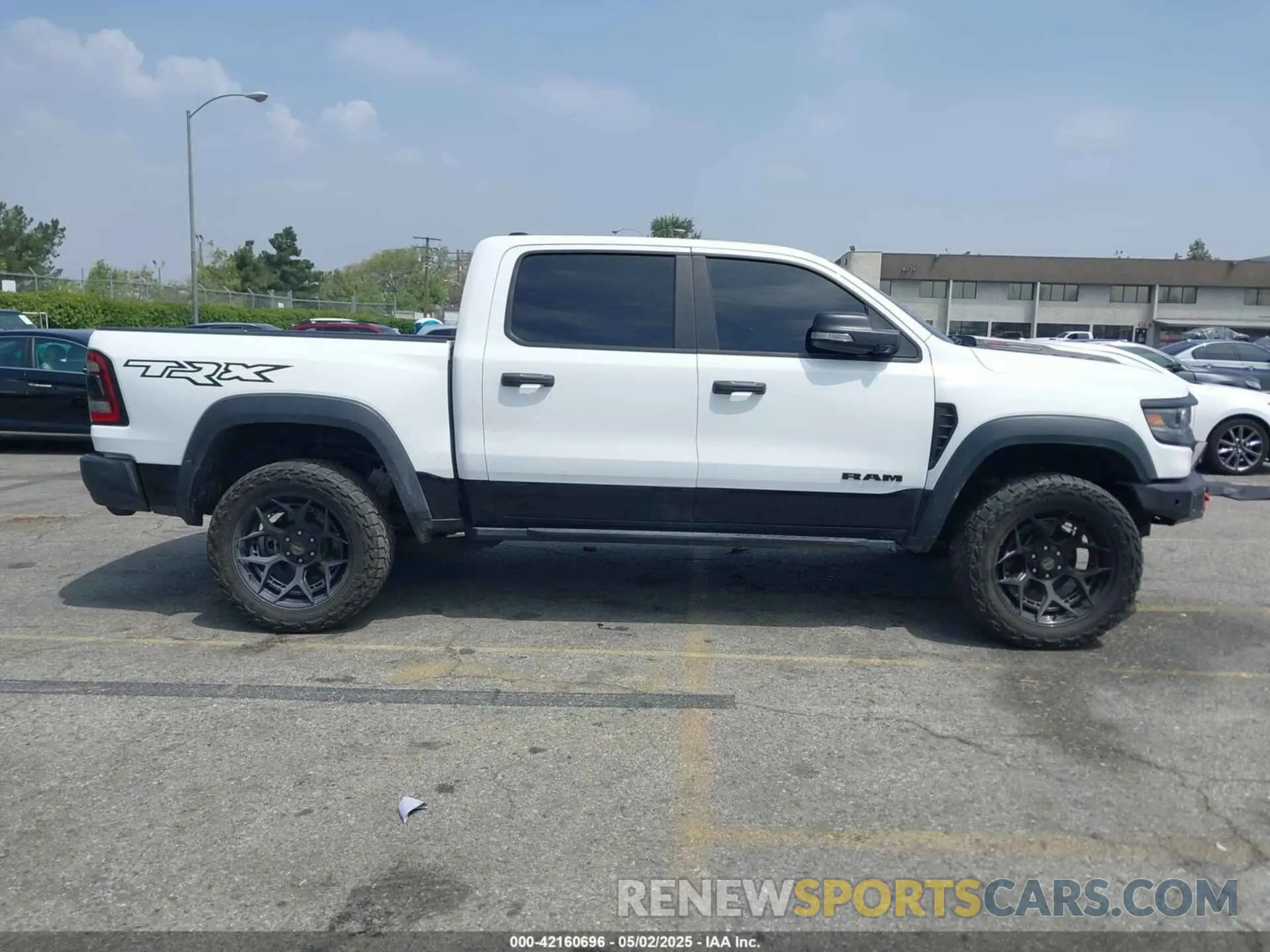12 Photograph of a damaged car 1C6SRFU97NN168472 RAM 1500 2022