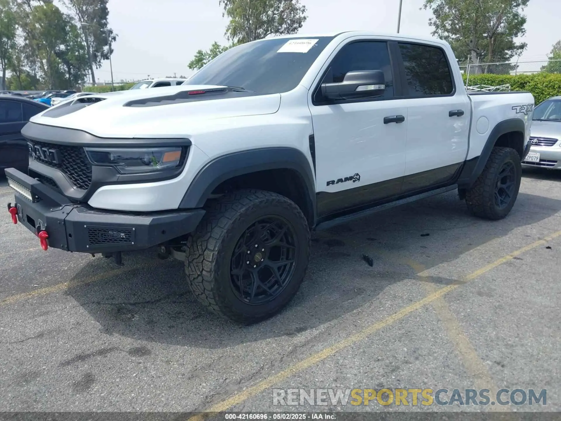 2 Photograph of a damaged car 1C6SRFU97NN168472 RAM 1500 2022