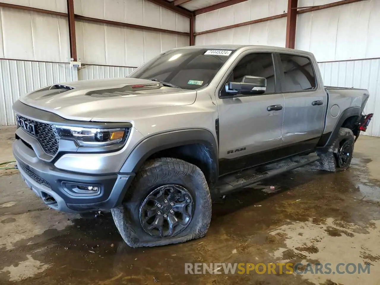 1 Photograph of a damaged car 1C6SRFU97NN403064 RAM 1500 2022