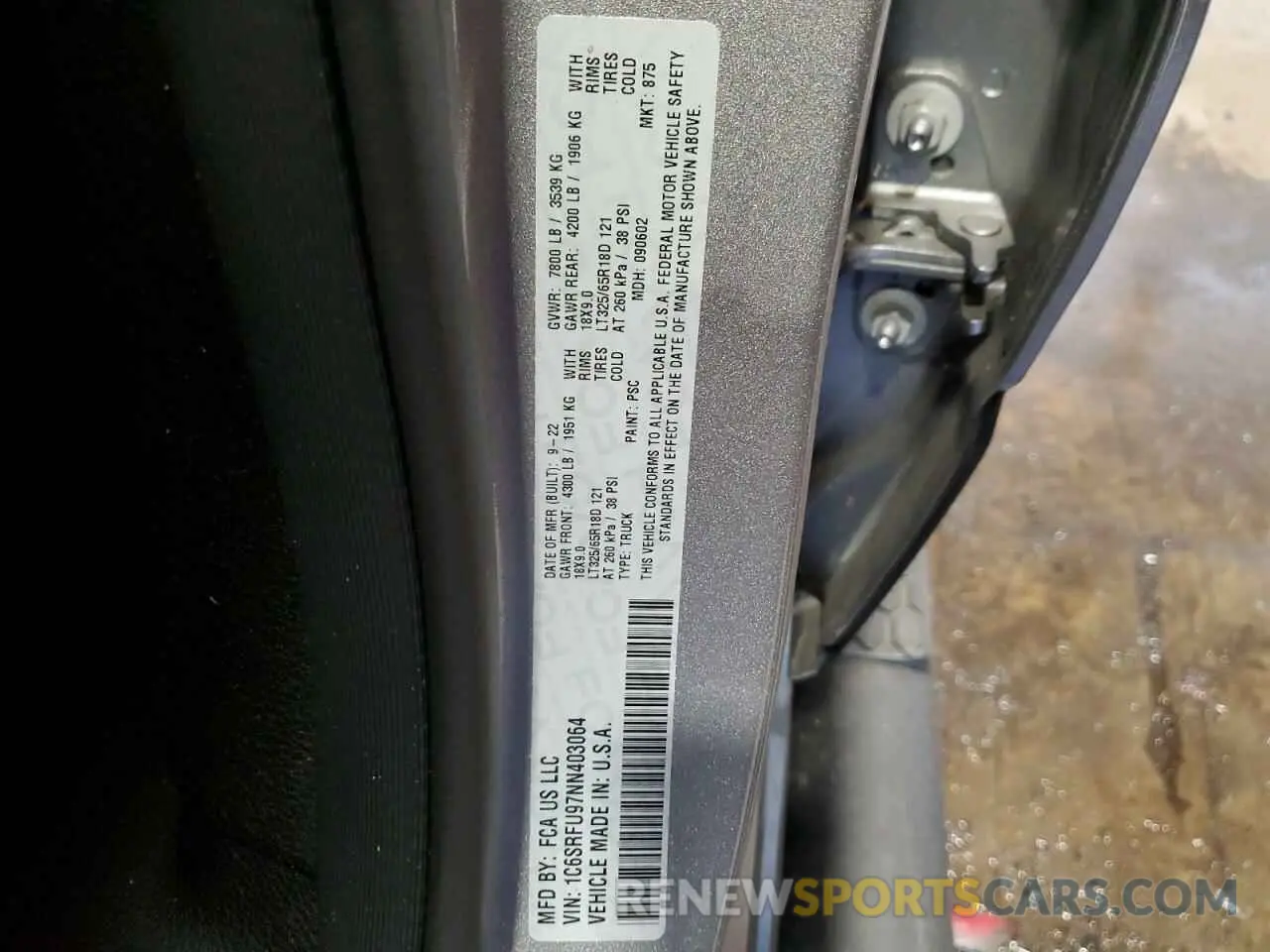 12 Photograph of a damaged car 1C6SRFU97NN403064 RAM 1500 2022