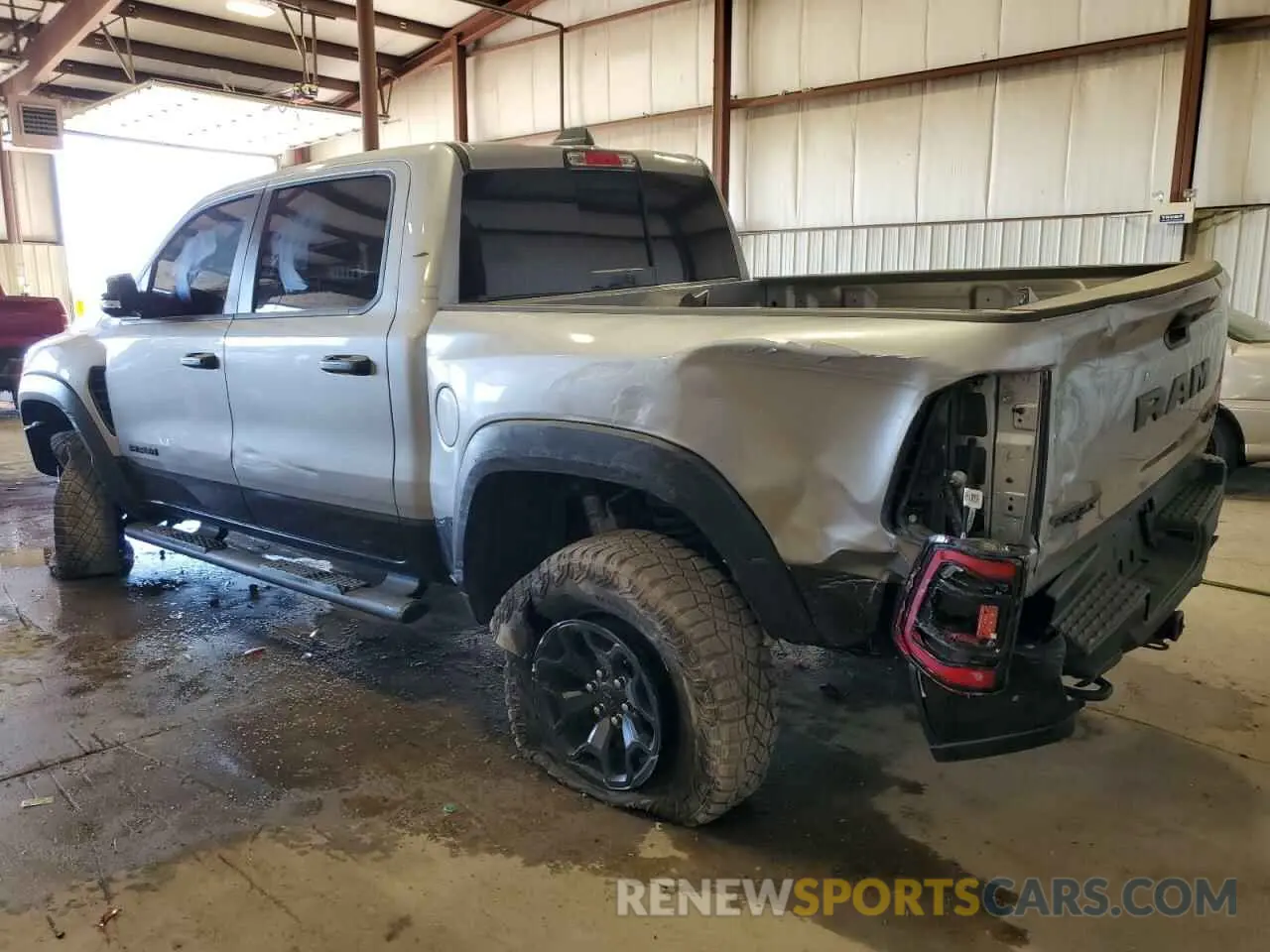2 Photograph of a damaged car 1C6SRFU97NN403064 RAM 1500 2022