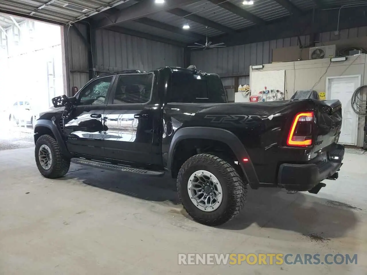 2 Photograph of a damaged car 1C6SRFU99NN320249 RAM 1500 2022